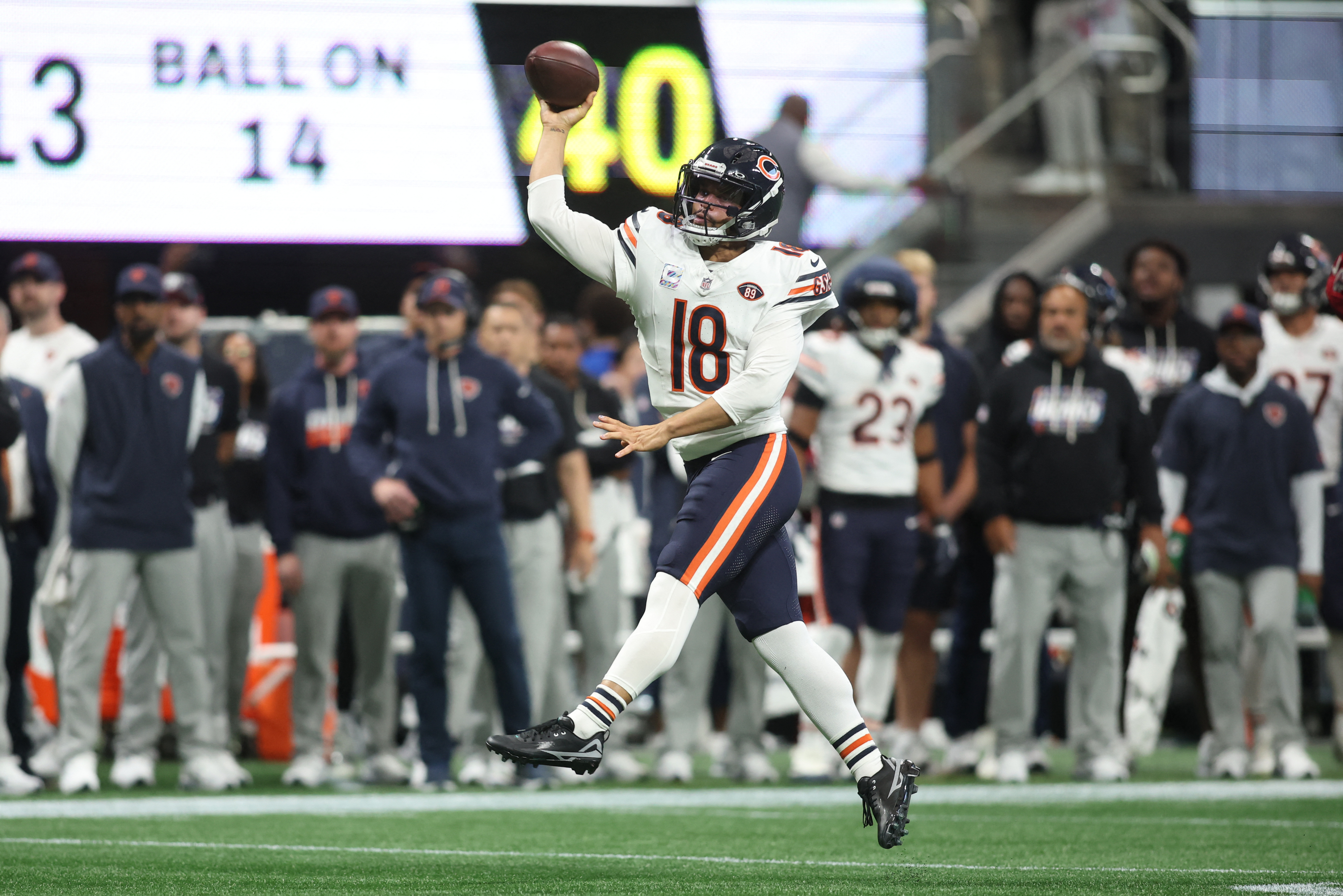 Pictured: Bears quarterback Caleb Williams throwing a pass as we break down our NFL AI Predictions: Week 7 ATS Picks & Score Projections for Every Matchup. Photo by Brett Davis-Imagn Images.