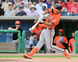 Jackson Holliday #87 of the Baltimore Orioles hits a foul ball as we look at the best MLB Rookie of the Year odds