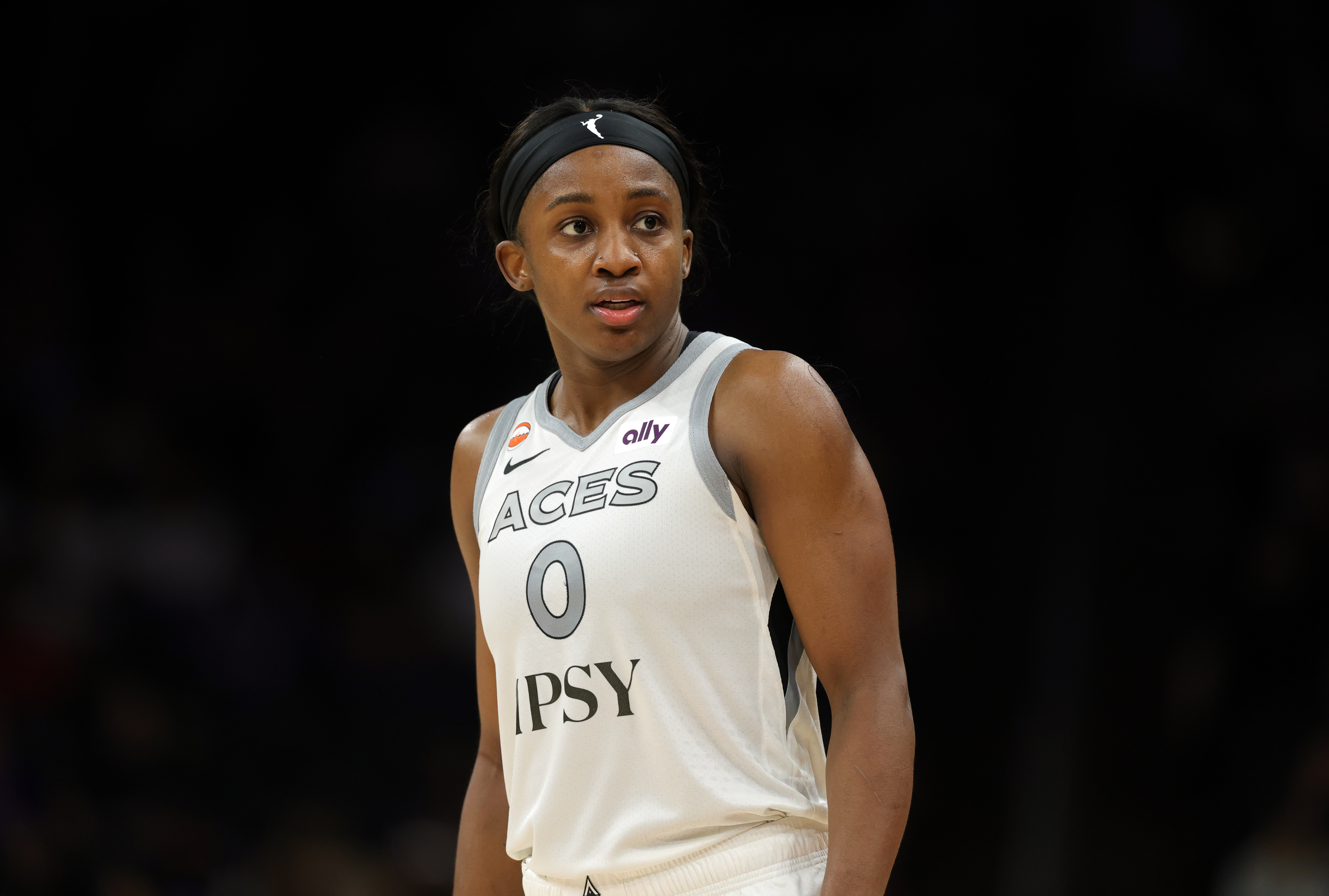 Las Vegas Aces guard Jackie Young (0) looks on as we break down our Wings vs. Aces prediction.