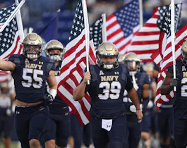 The Navy Midshipmen take the field before playing against the East Carolina Pirates during the first half at Navy-Marine Corps Memorial Stadium on November 20, 2021 in Annapolis, Maryland.