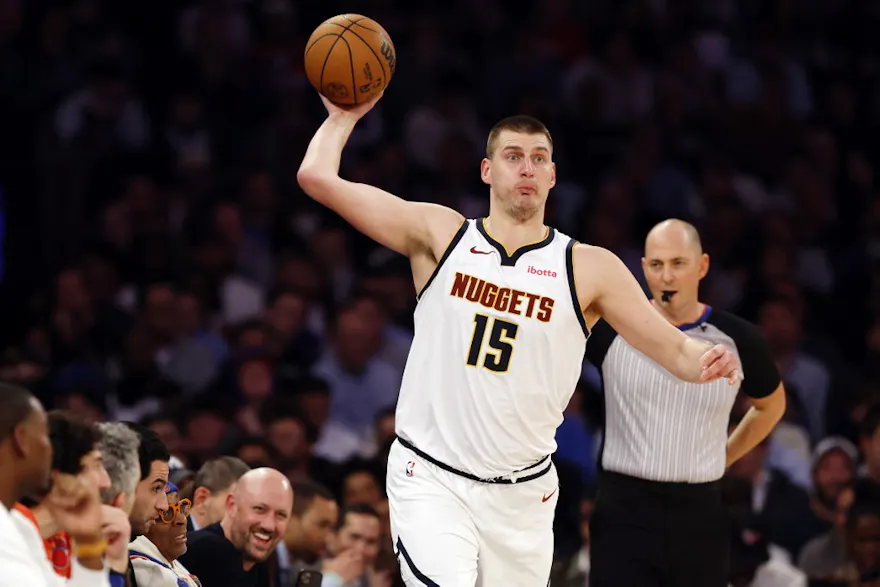Nikola Jokic of the Denver Nuggets passes the ball during the first half against the New York Knicks, and we offer our top NBA player props and best bets based on the best NBA odds.