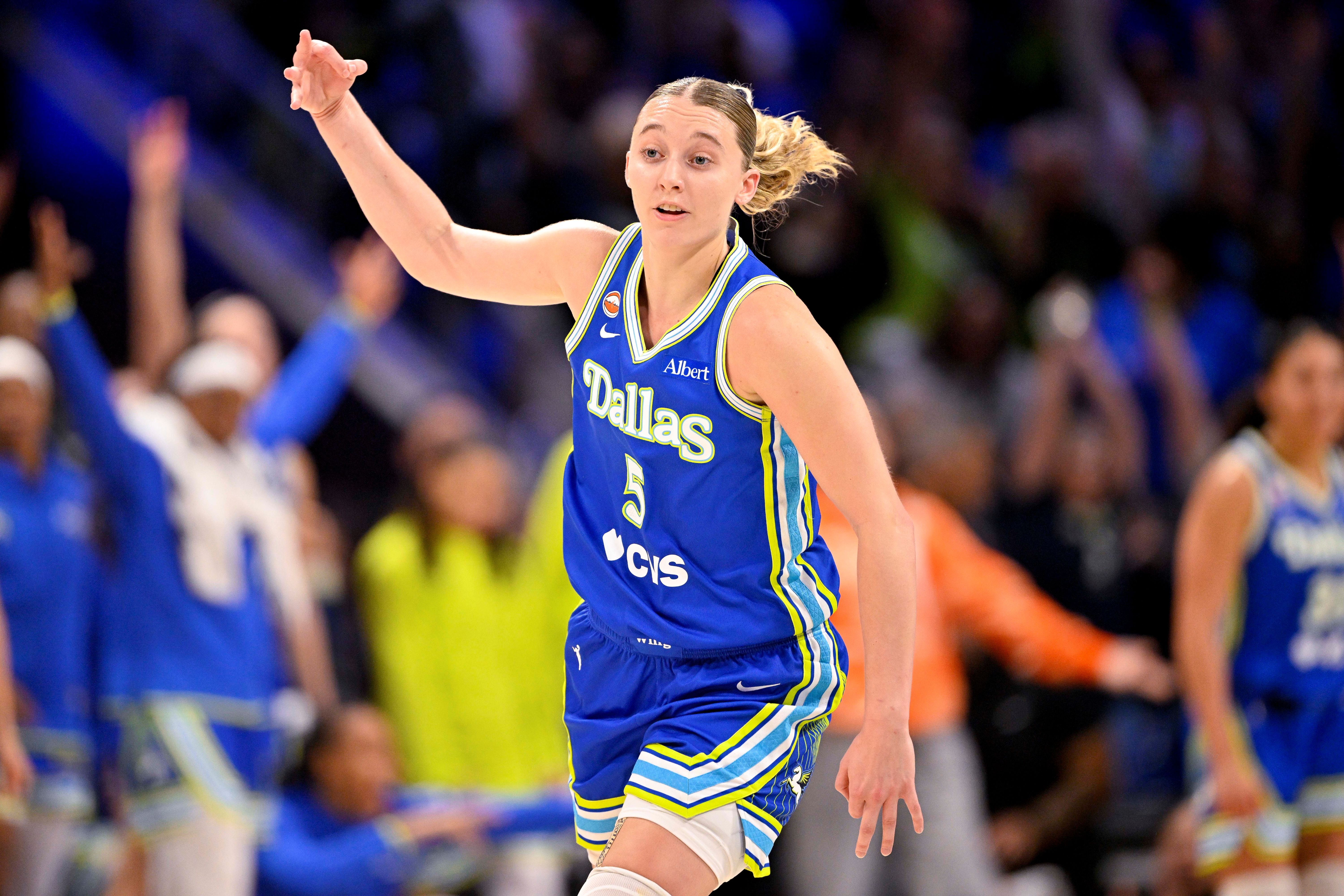 Dallas Wings guard Paige Bueckers (5) celebrates as we break down our Dream vs. Wings prediction.