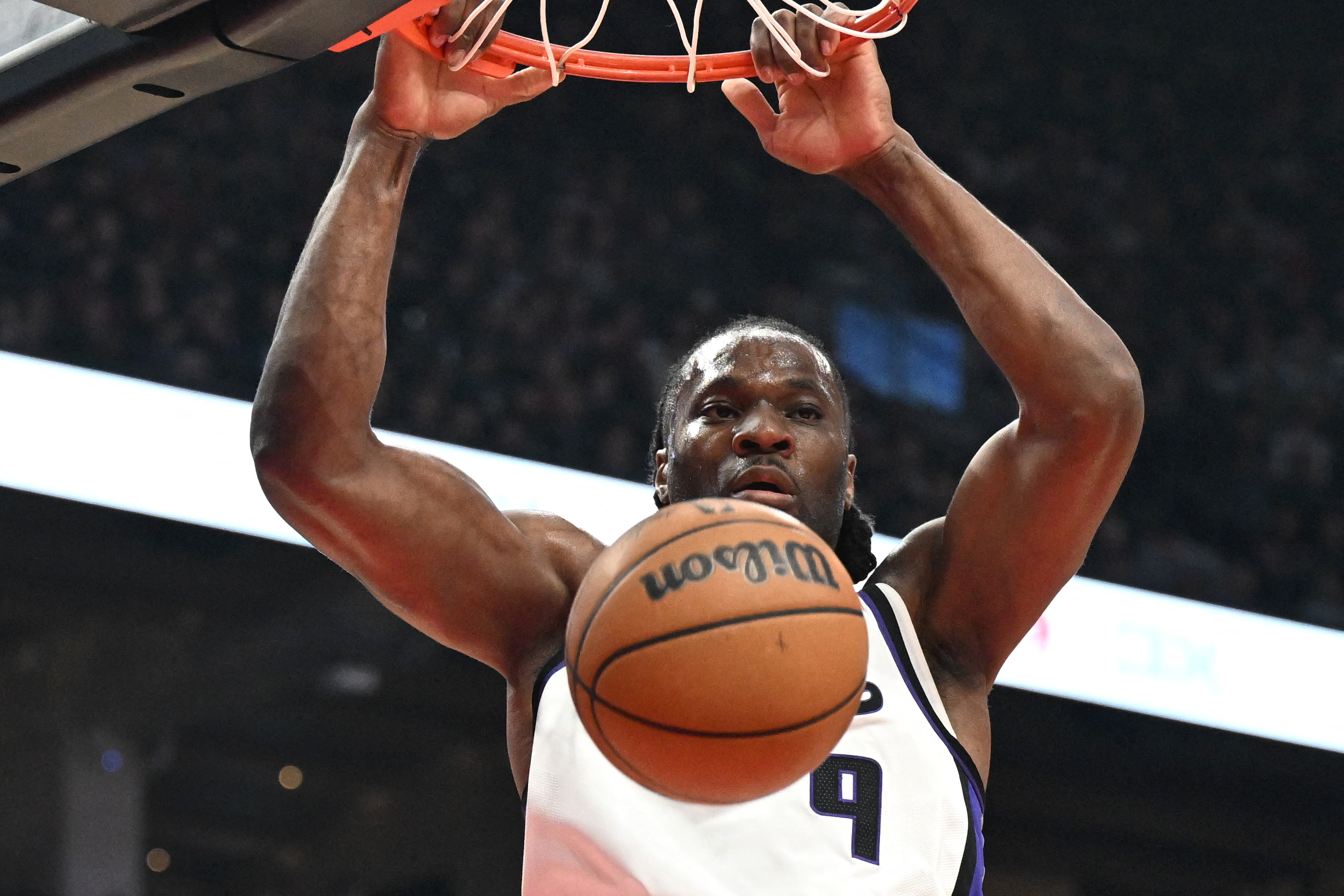 Sacramento Kings forward Precious Achiuwa (9), seen here dunking, is featured in our NBA player props today.