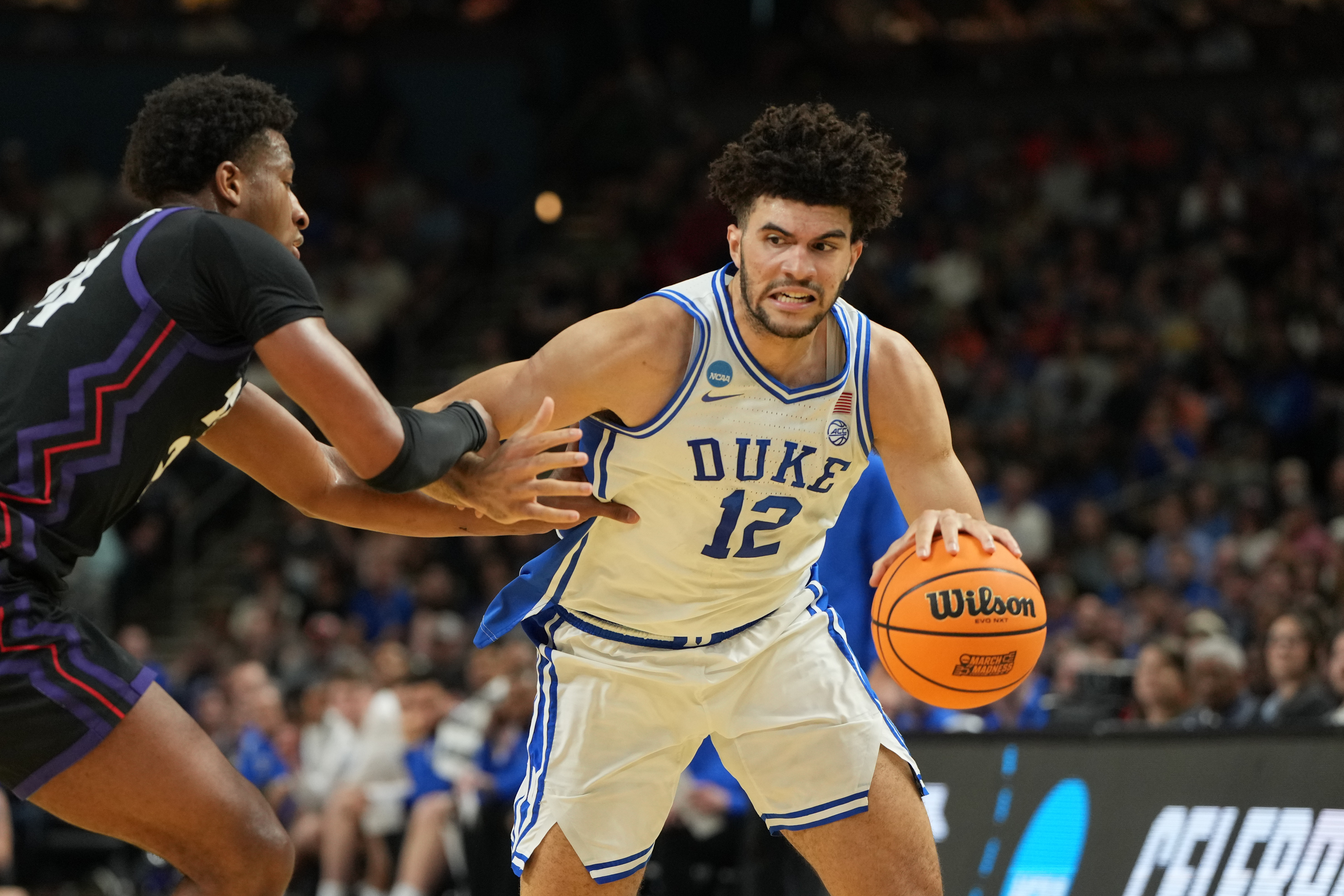 Duke and Cameron Boozer (12) are the focus of our breakdown of the March Madness prediction market odds. 