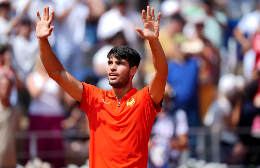Carlos Alcaraz celebrates after defeating Felix Auger-Aliassime during the Paris 2024 Olympic Summer Games as we offer our prediction for the Olympic final featuring Alcaraz and Novak Djokovic.