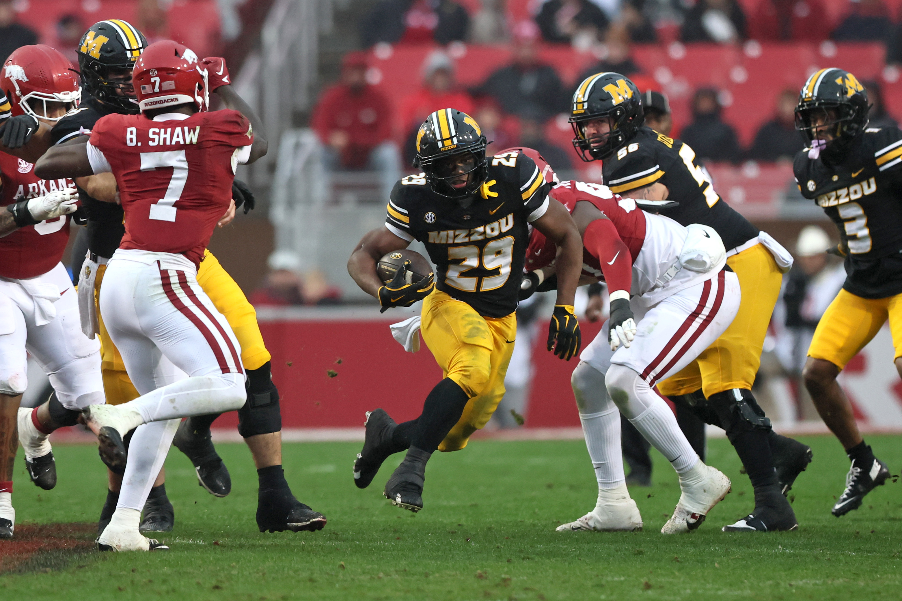  Missouri Tigers running back Ahmad Hardy in action as we offer the college football predictions for this week's bowl games. 