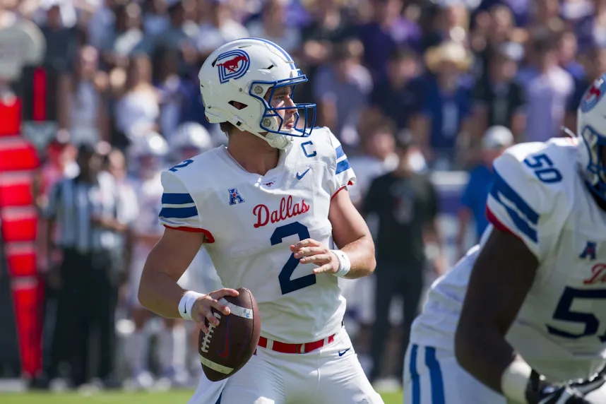 SMU Mustangs quarterback Preston Stone drops back to pass against the TCU Horned Frogs.