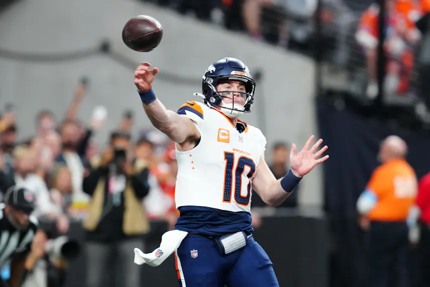 Denver Broncos quarterback Bo Nix makes a pass as we make our best Browns vs. Broncos early picks.