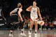Kelsey Plum (10) of the Las Vegas Aces handles the ball against Courtney Vandersloot (22) of the New York Liberty, as we break down our WNBA power rankings with analysis for every team.