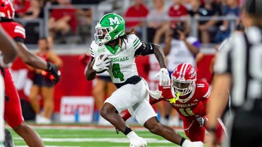 Demarcus Lacey against the Thundering Herd at Our Lady of Lourdes Stadium as we offer Marshall vs. Coastal Carolina Prediction.