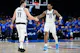 P.J. Washington (25) and Luka Doncic (77) of the Dallas Mavericks high five during the fourth quarter against the Oklahoma City Thunder, as we offer our Thunder vs. Mavericks player props for Saturday's Game 3 at American Airlines Center in Dallas.