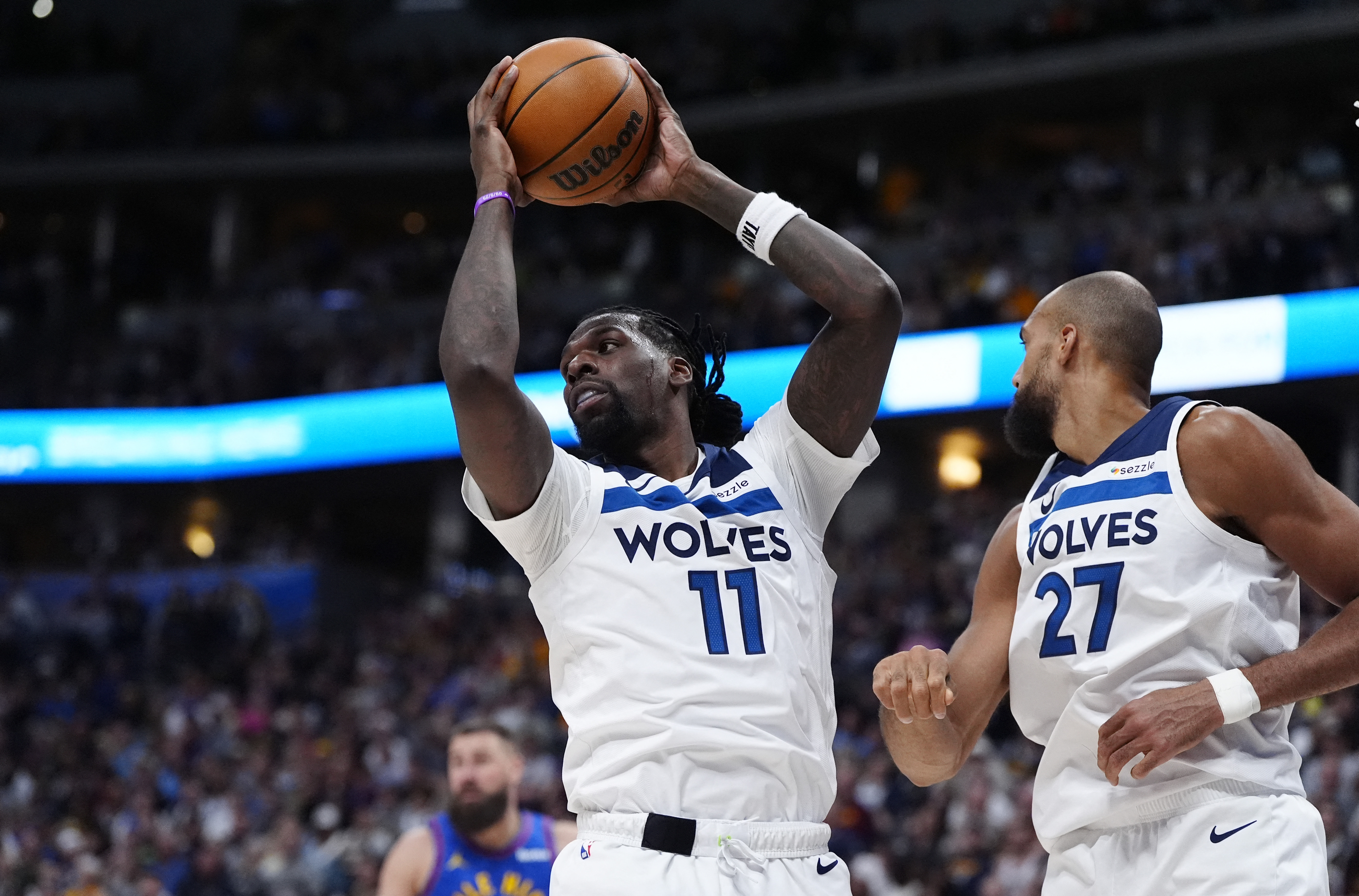 Minnesota Timberwolves center Naz Reid (11) grabs a rebound as we break down our NBA Sixth Man of the Year odds & favorites.