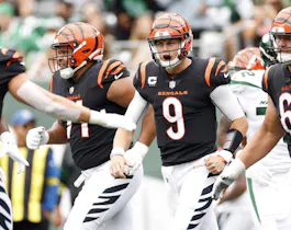 Joe Burrow #9 of the Cincinnati Bengals reacts after throwing a touchdown pass against the New York Jets during the first quarter at MetLife Stadium on Sept. 25.