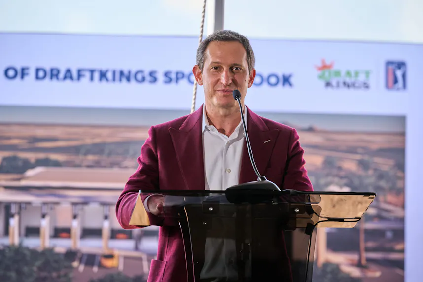 DraftKings CEO Jason Robins addresses the crowd during the DraftKings Sportsbook groundbreaking ceremony as we look at the company's course reversal on the winning tax surcharge.
