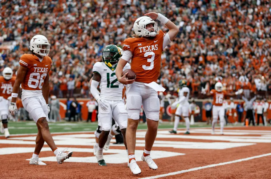 Quinn Ewers of the Texas Longhorns reacts after rushing for a touchdown against the Baylor Bears at Darrell K Royal-Texas Memorial Stadium in Austin, Texas. Photo by Tim Warner/Getty Images via AFP.