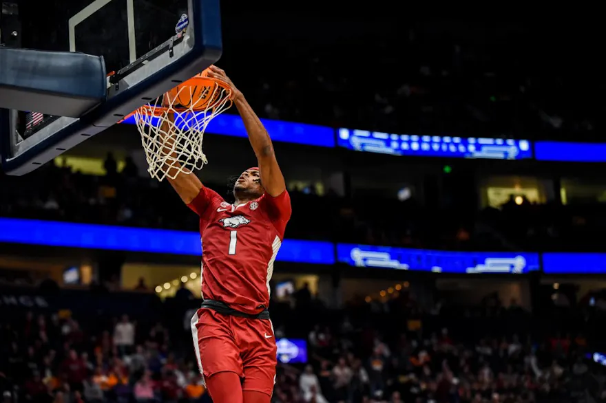 Ricky Council IV of the Arkansas Razorbacks dunks the ball as we look at our Arkansas vs. Kansas prediction