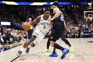 Anthony Edwards of the Minnesota Timberwolves drives to the basket against Jamal Murray of the Denver Nuggets during Game 7. We're breaking down Anthony Edwards odds ahead of the Western Conference Finals.