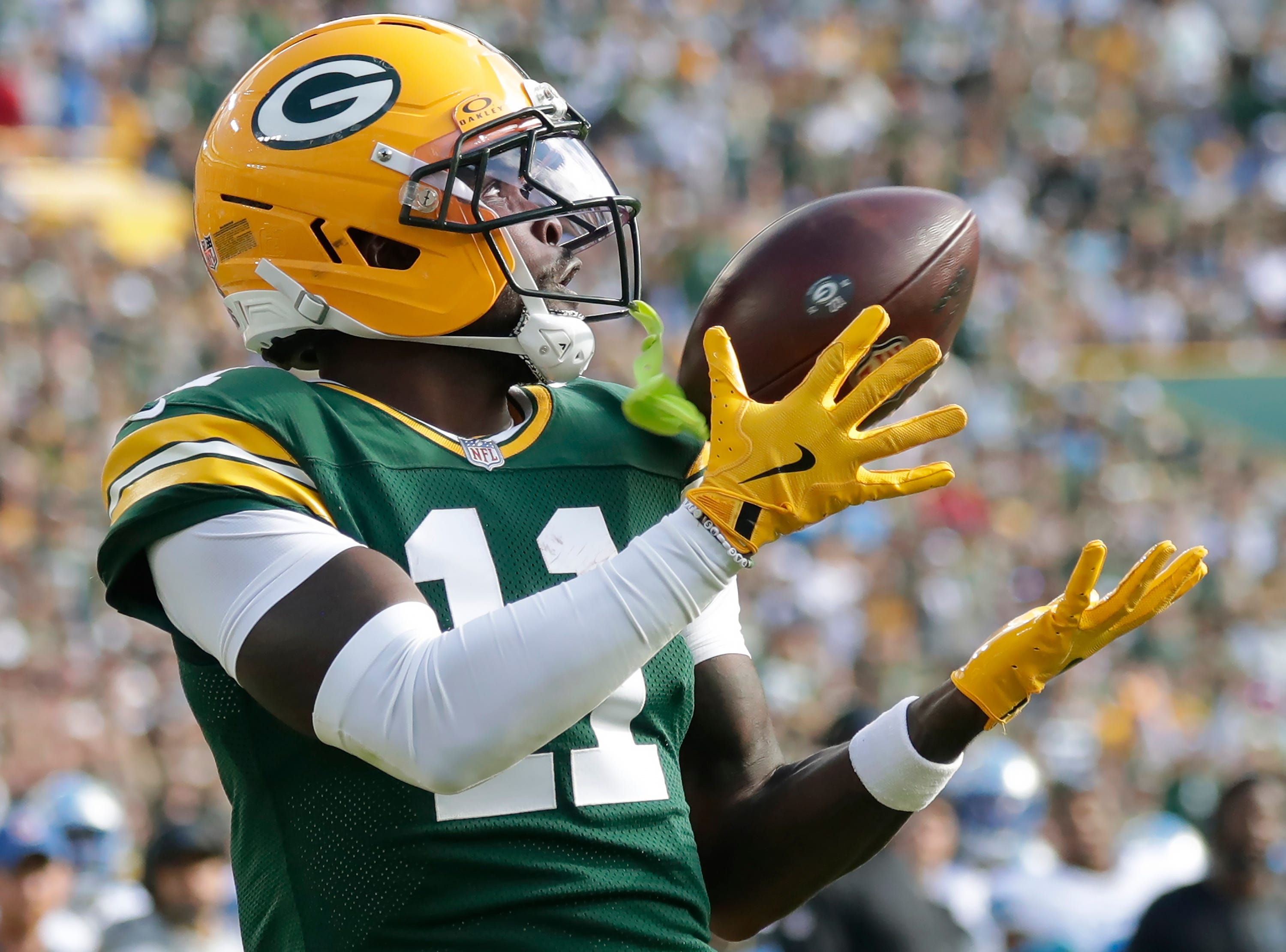 Green Bay Packers wide receiver Jayden Reed (11) catches a second quarter touchdown pass as part of our Packers vs. Bears predictions.