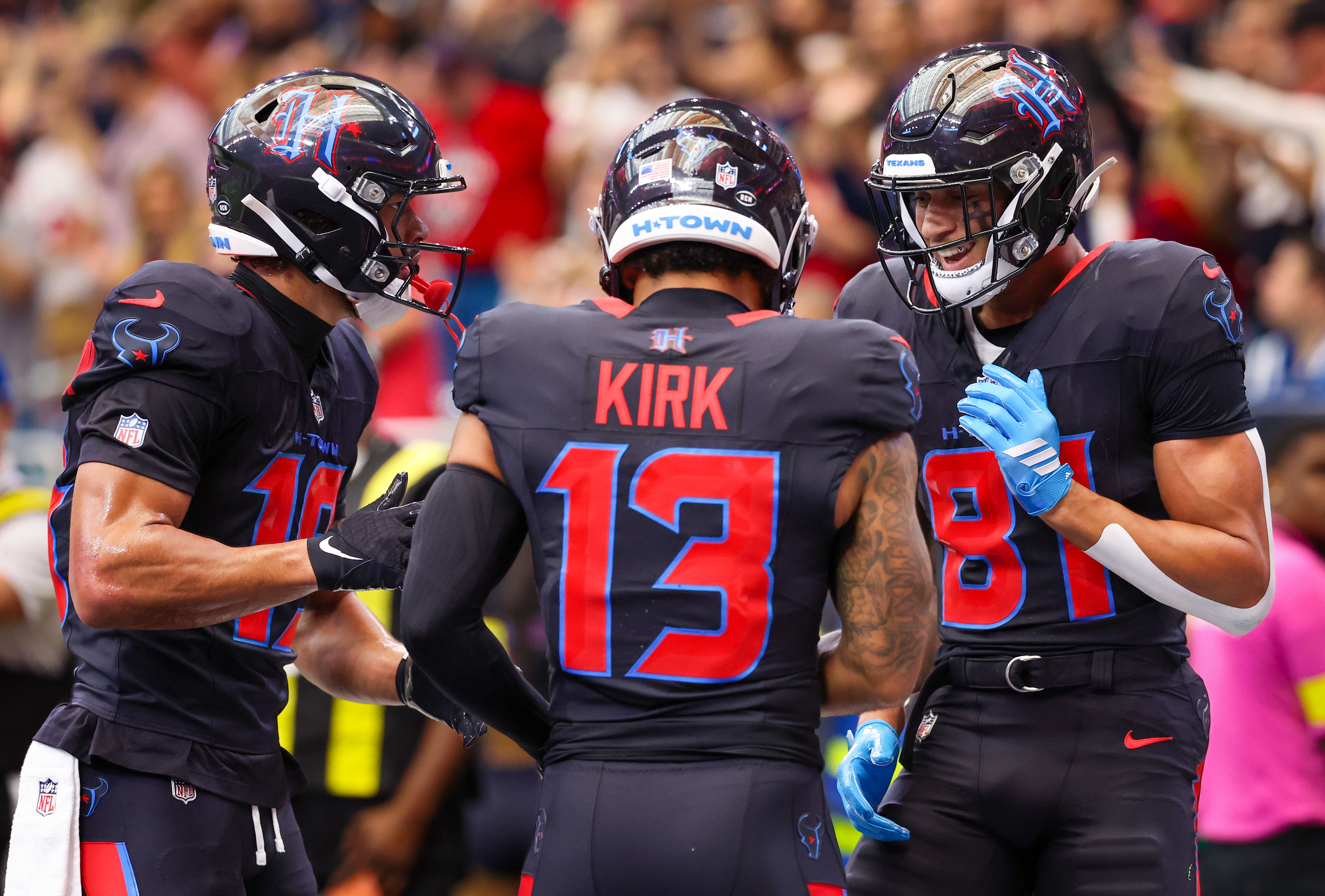 Houston Texans wide receiver Xavier Hutchinson (19) and wide receiver Christian Kirk - who's featured in our Texans vs. Patriotrs expert picks - celebrates. 