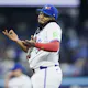 Vladimir Guerrero Jr. of the Toronto Blue Jays reacts after an overturned play to award him the out against Anthony Volpe of the New York Yankees in the first inning on April 17, 2024 in Toronto as we look at our Blue Jays-Phillies player props.