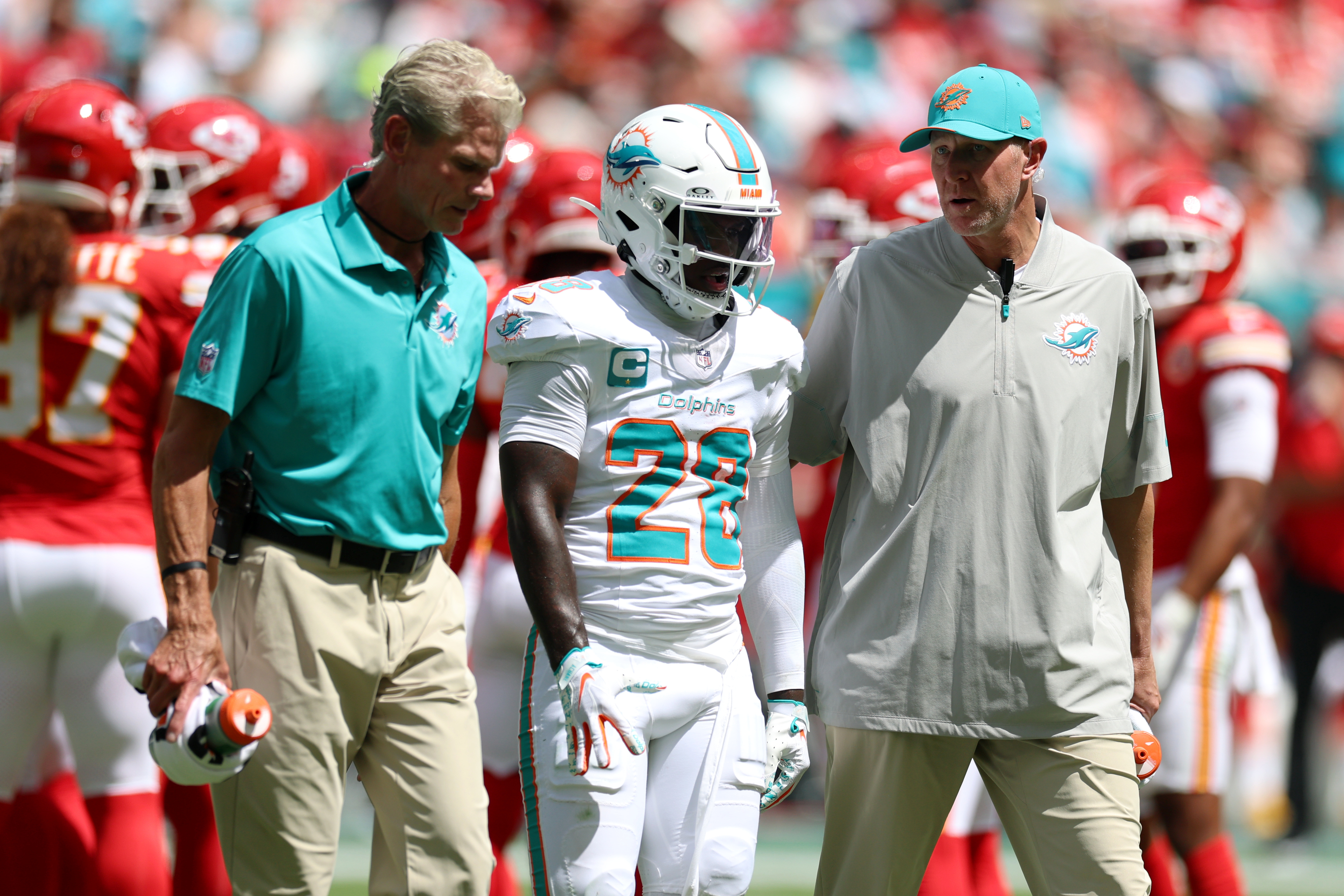 Miami Dolphins running back De'Von Achane is walked off the field as we look at NFL Week 4 injury reports.