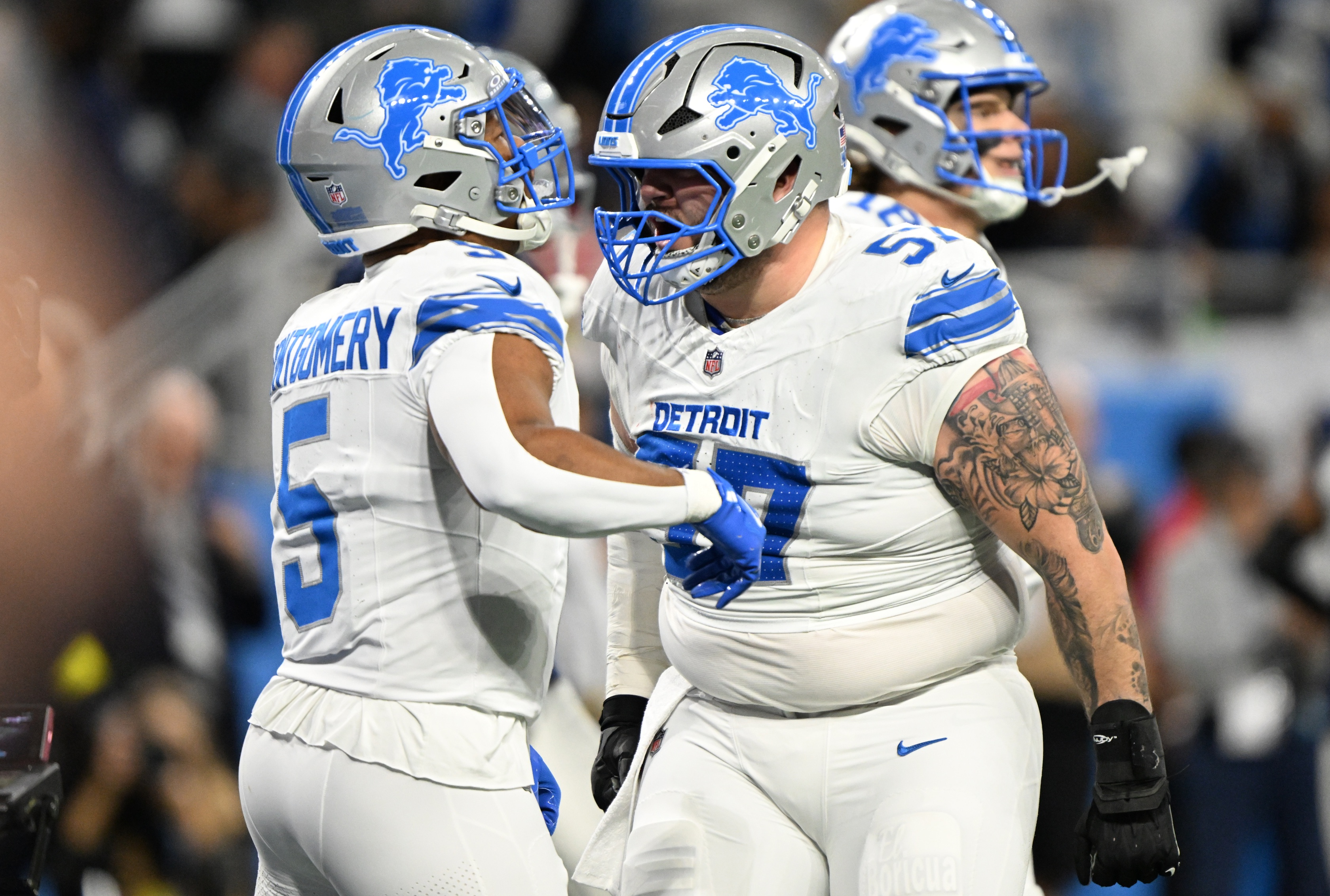 Detroit Lions running back David Montgomery celebrates with center Trystan Colon as we make our best Christmas Day parlay.