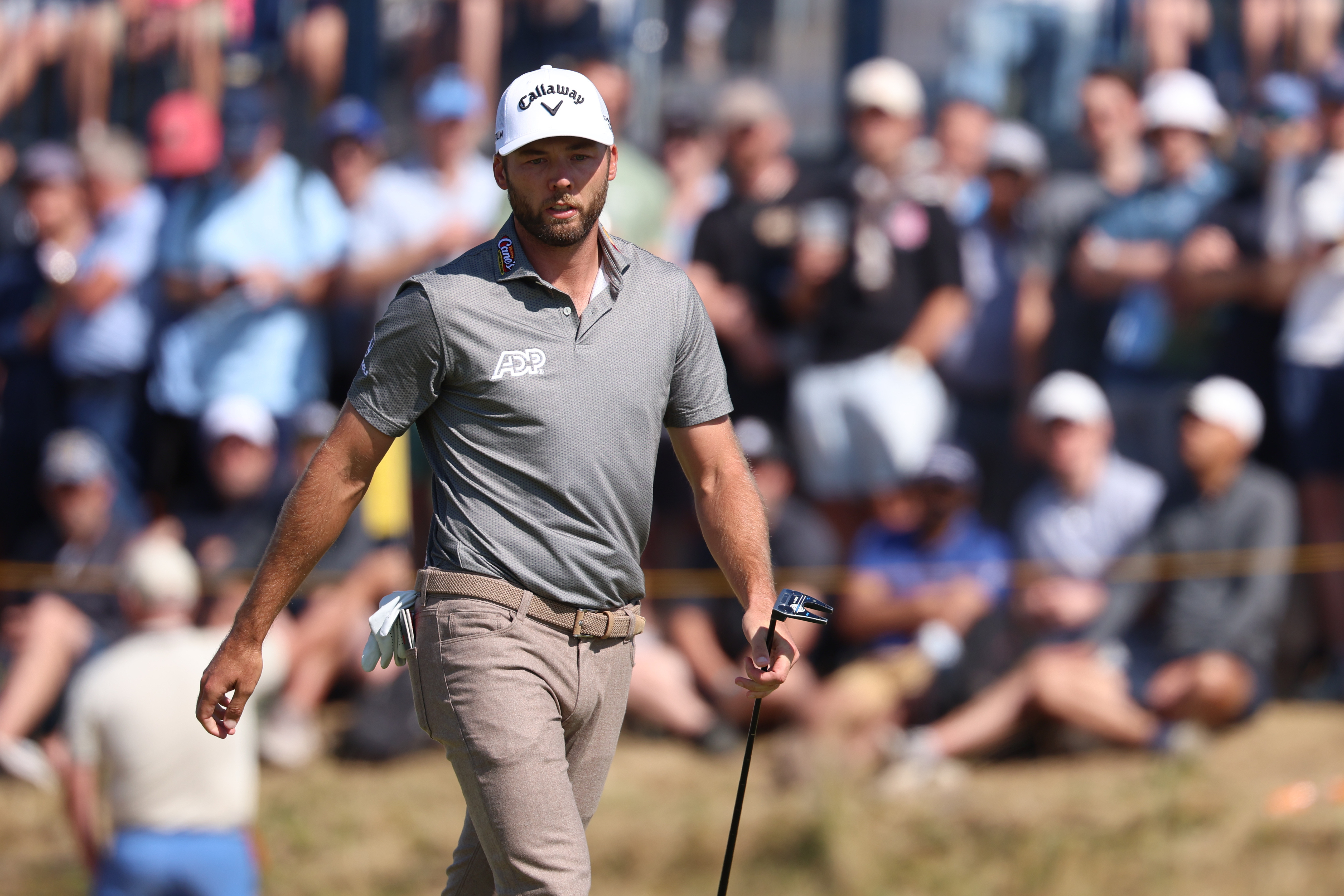 Sam Burns reacts after putting as he is featured in our FedEx Cup picks & predictions.
