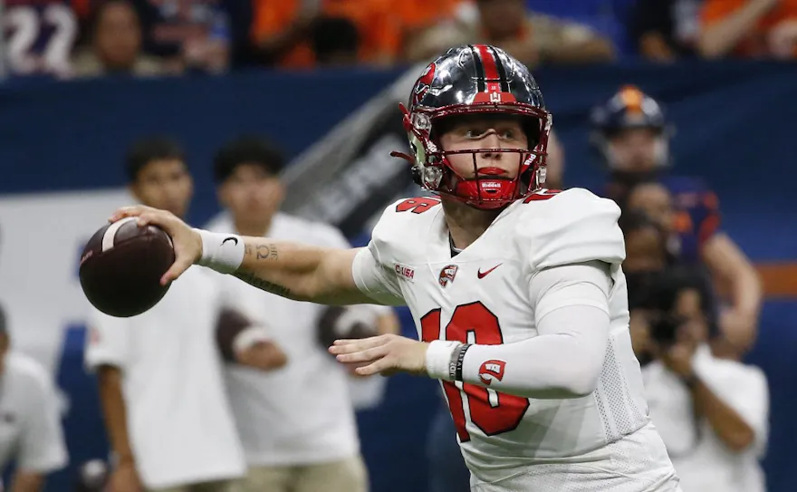 Austin Reed of the Western Kentucky Hilltoppers looks to pass against the UTSA Roadrunners at the Alamodome as we look at our Western Kentucky-Jacksonville State prediction.