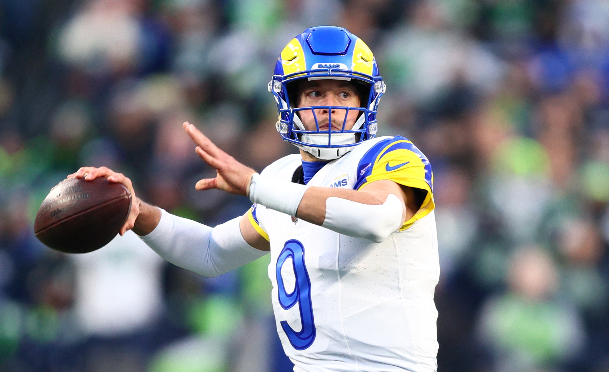  Los Angeles Rams quarterback Matthew Stafford passes as we make our best 49ers vs. Rams prediction