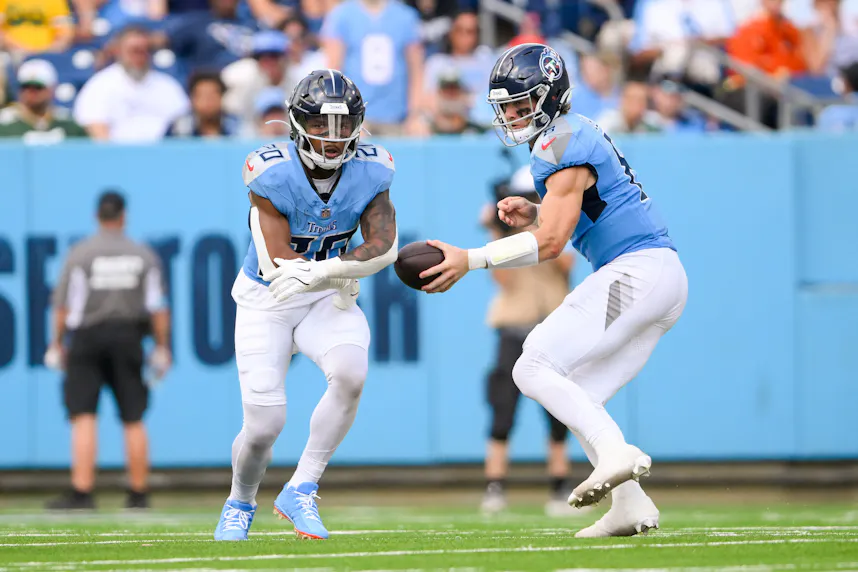 Tennessee Titans Will Levis (8) fakes the hand off as we offer our best Titans vs. Dolphins prediction for Monday Night Football.