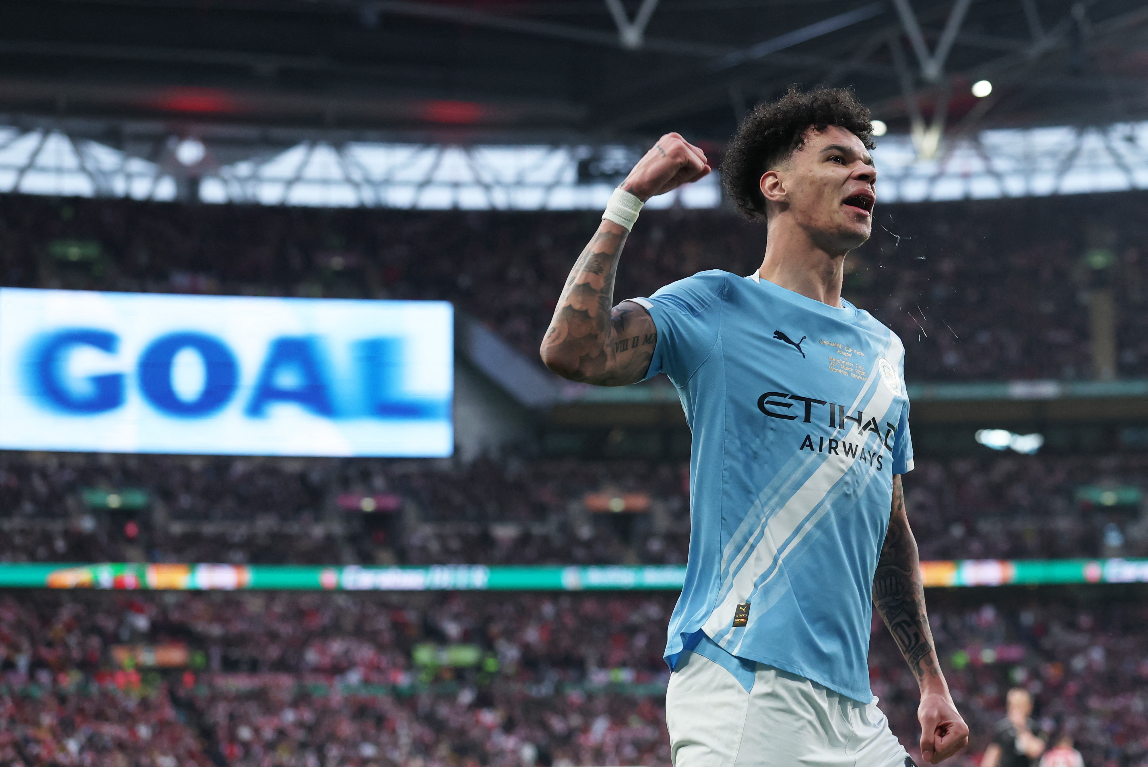 Manchester City's Nico O'Reilly celebrates scoring as we make our best Manchester City vs. Arsenal prediction.