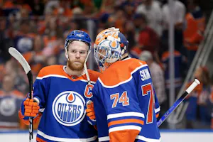 Connor McDavid and Stuart Skinner of the Edmonton Oilers celebrate as we look at the best 2024 Conn Smythe Trophy odds.