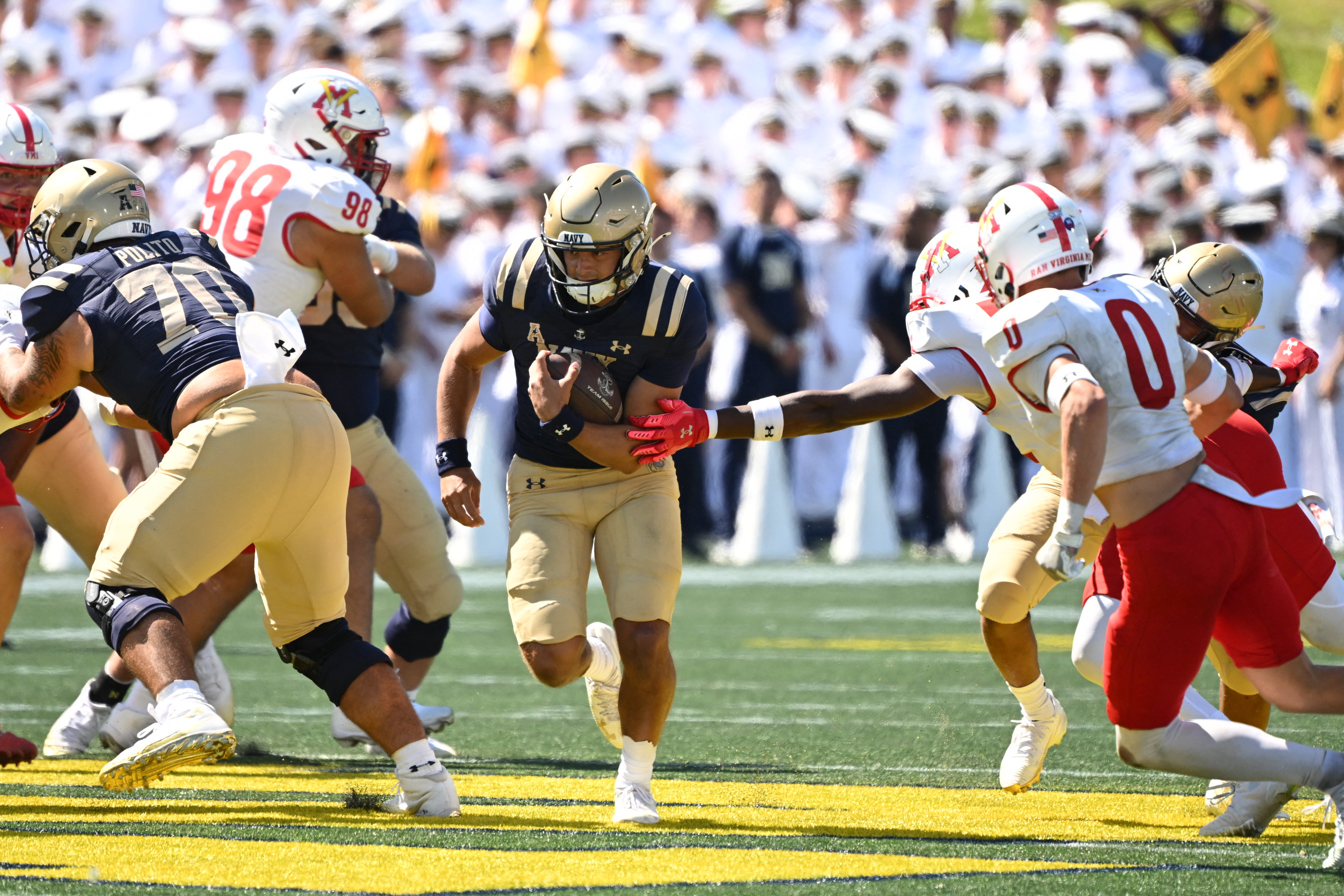 Navy quarterback Jackson Gutierrez (8) scrambles as we break down our Navy vs. Air Force prediction.