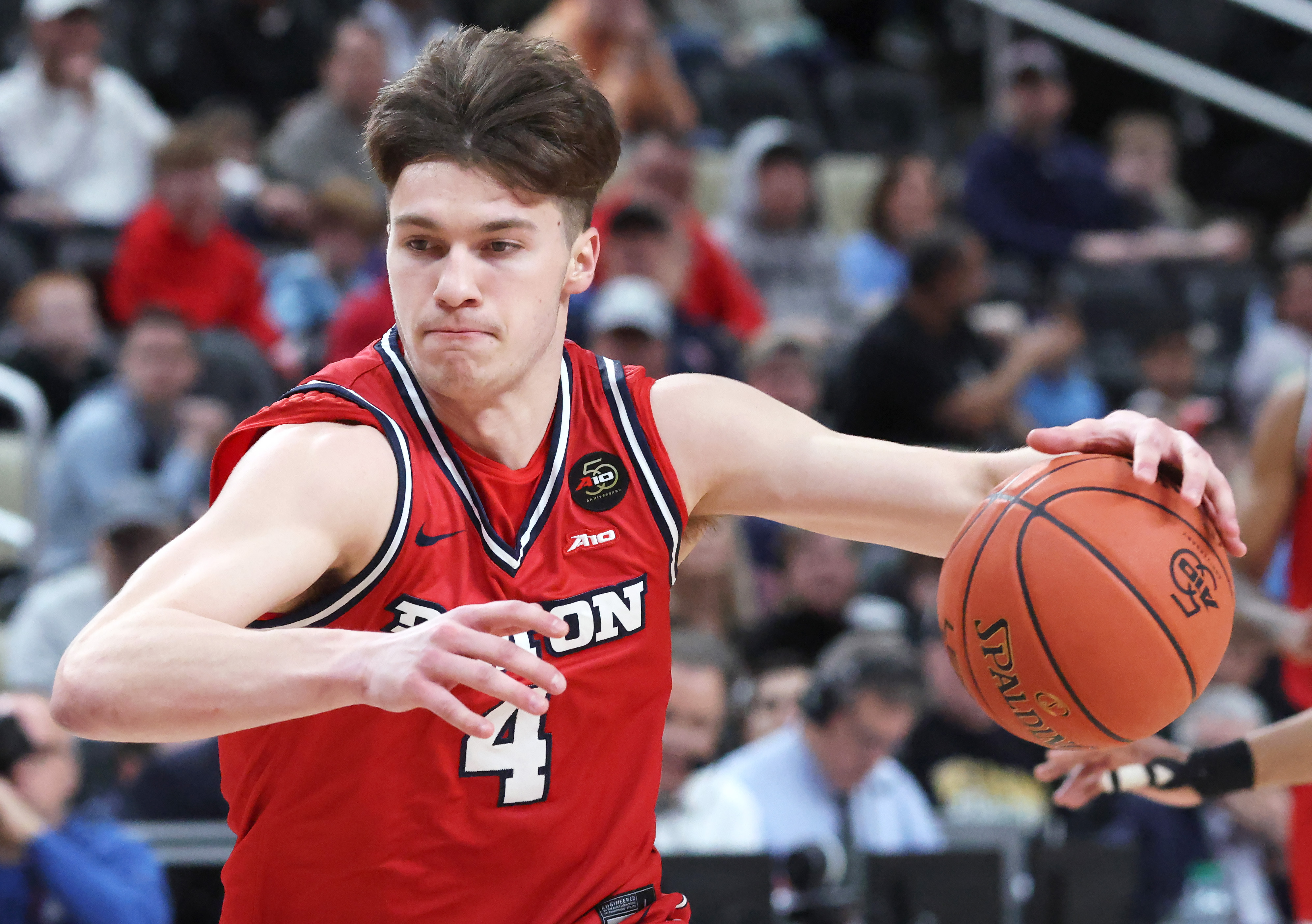 Dayton Flyers guard Jordan Derkack (4) drives to the basket as we break down our Illinois State vs. Dayton prediction & parlay.