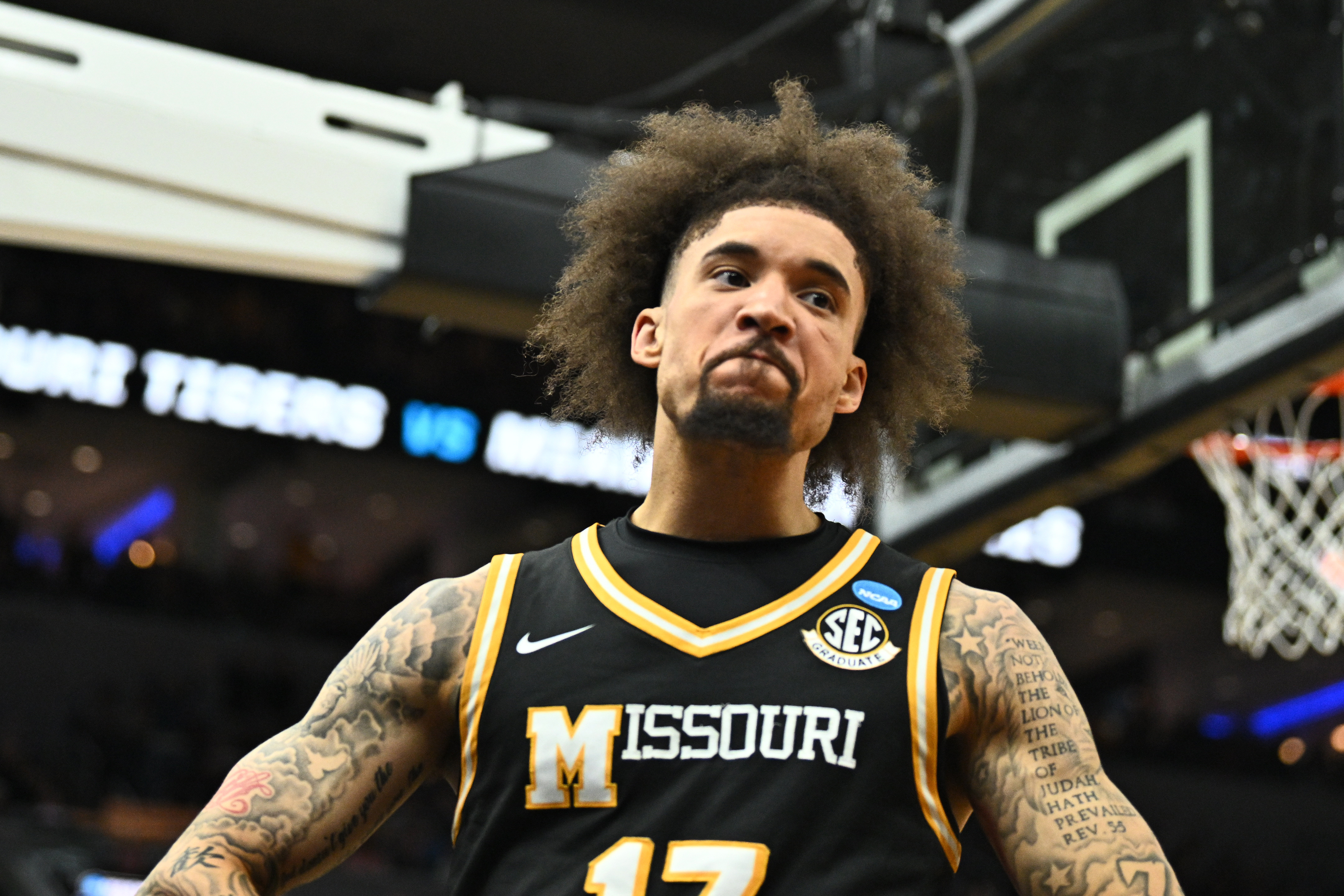 Missouri Tigers guard Jayden Stone reacts as we look at the impact of Missouri sports betting on neighboring states.