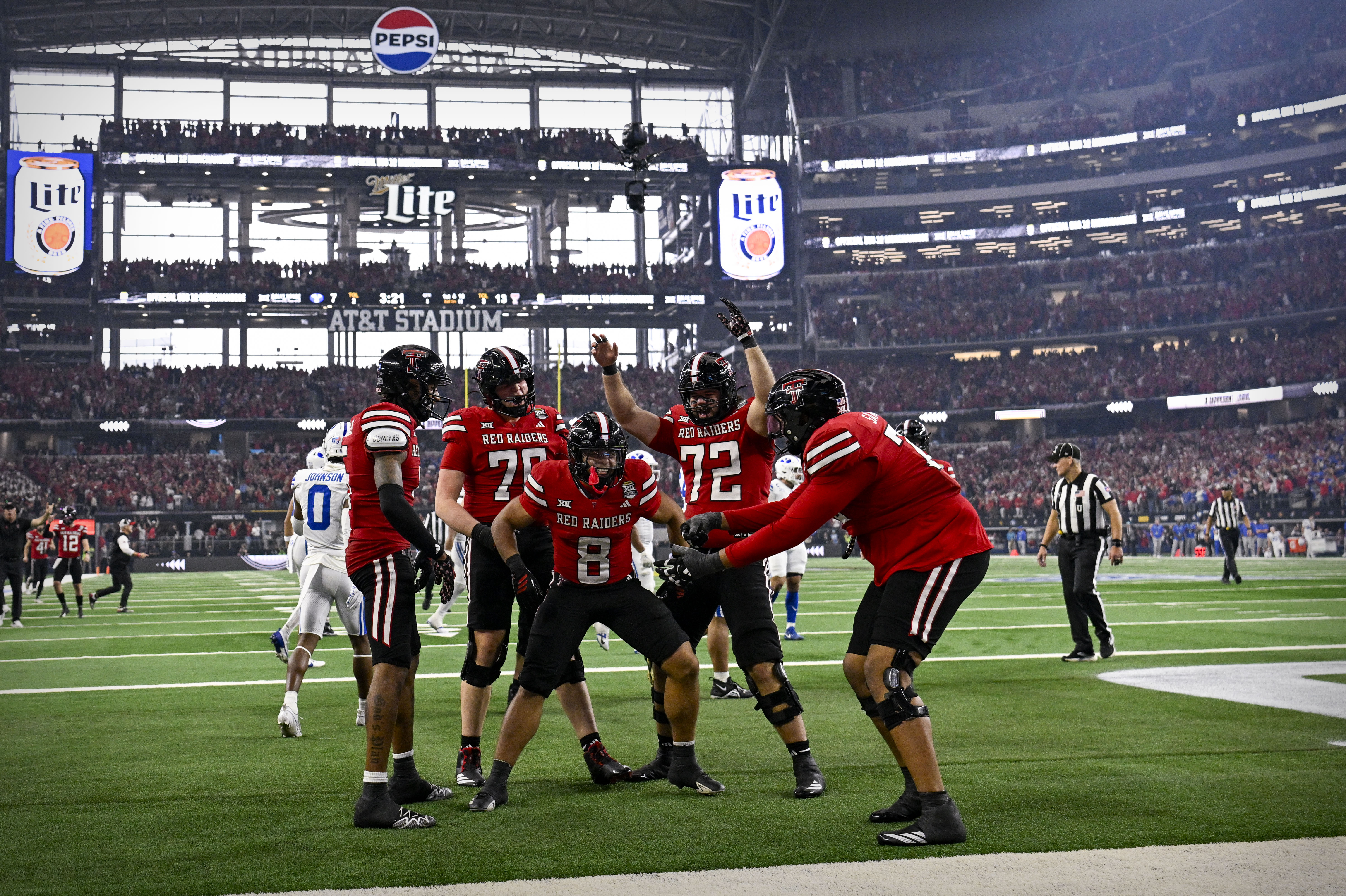 Texas Tech's Cameron Dickey (8) has the Red Raiders among the highest college football win totals for 2026. 