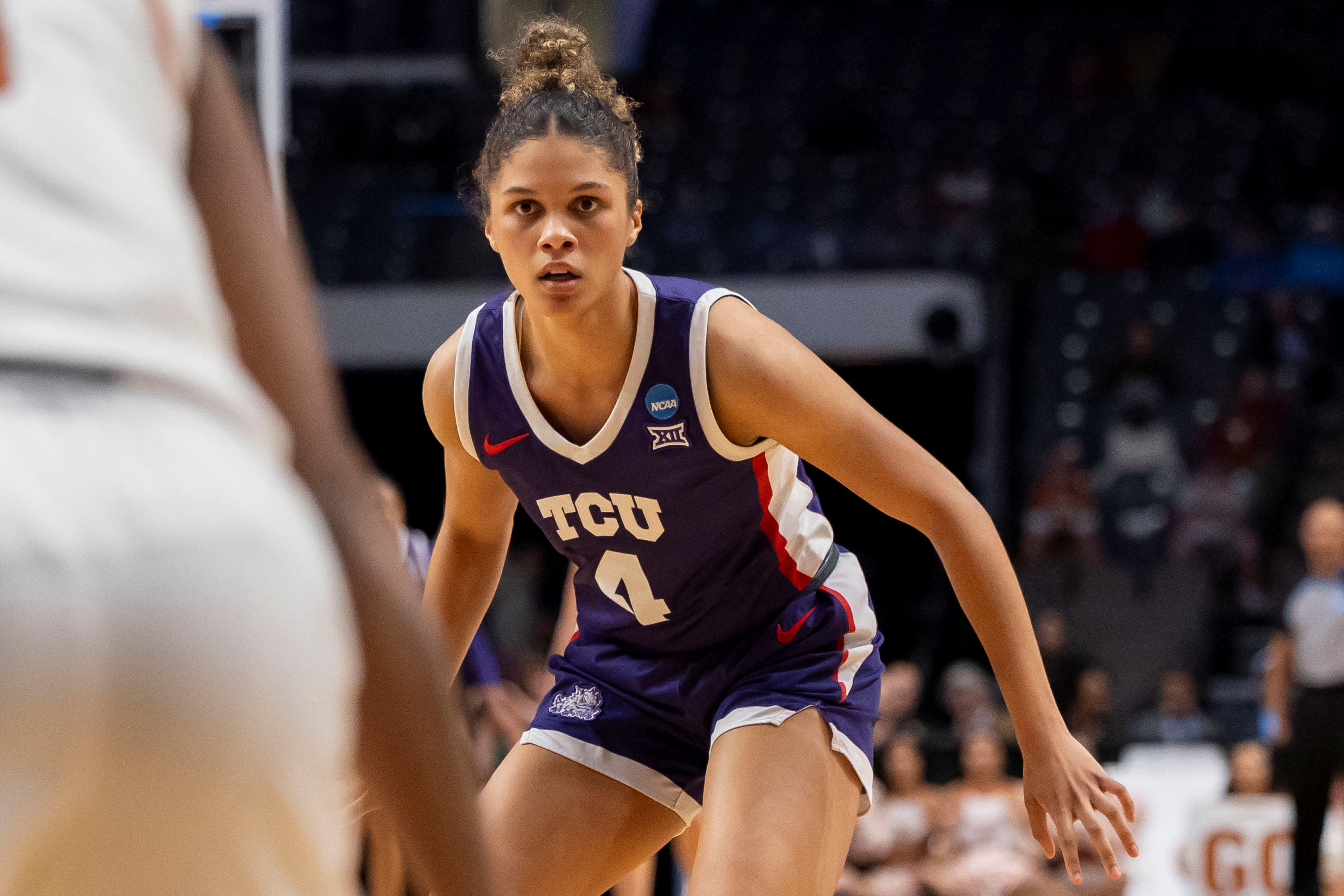 TCU Horned Frogs guard Donovyn Hunter sets up on defense, and she's central as we make our West Virginia vs. TCU predictions.