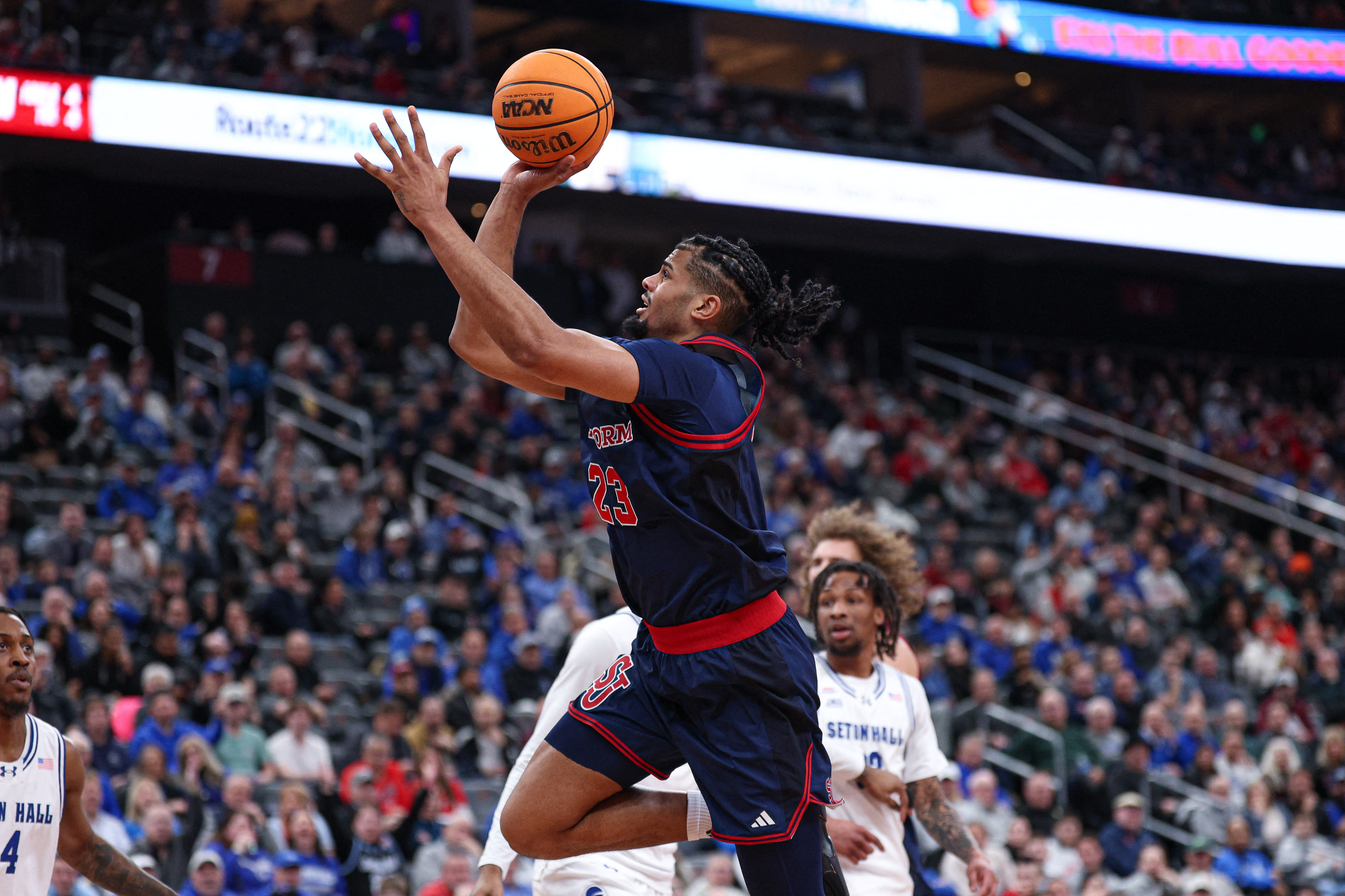 St. John's Red Storm forward Bryce Hopkins (23) goes to the basket as we break down our UConn vs. St. John's prediction.