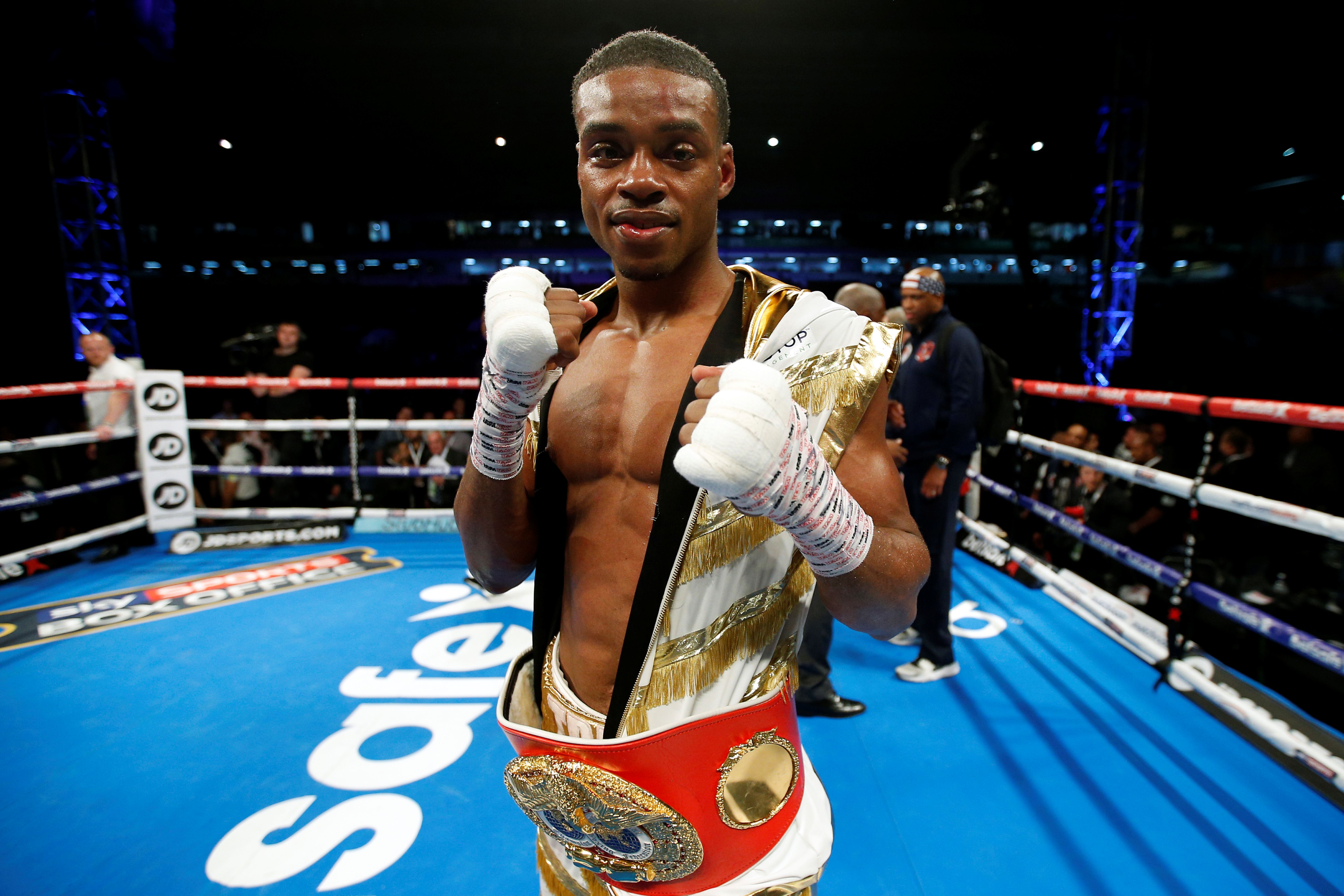 Errol Spence celebrates a win, and he's feature in my Errol Spence Vs Tim Tyszu predictions.