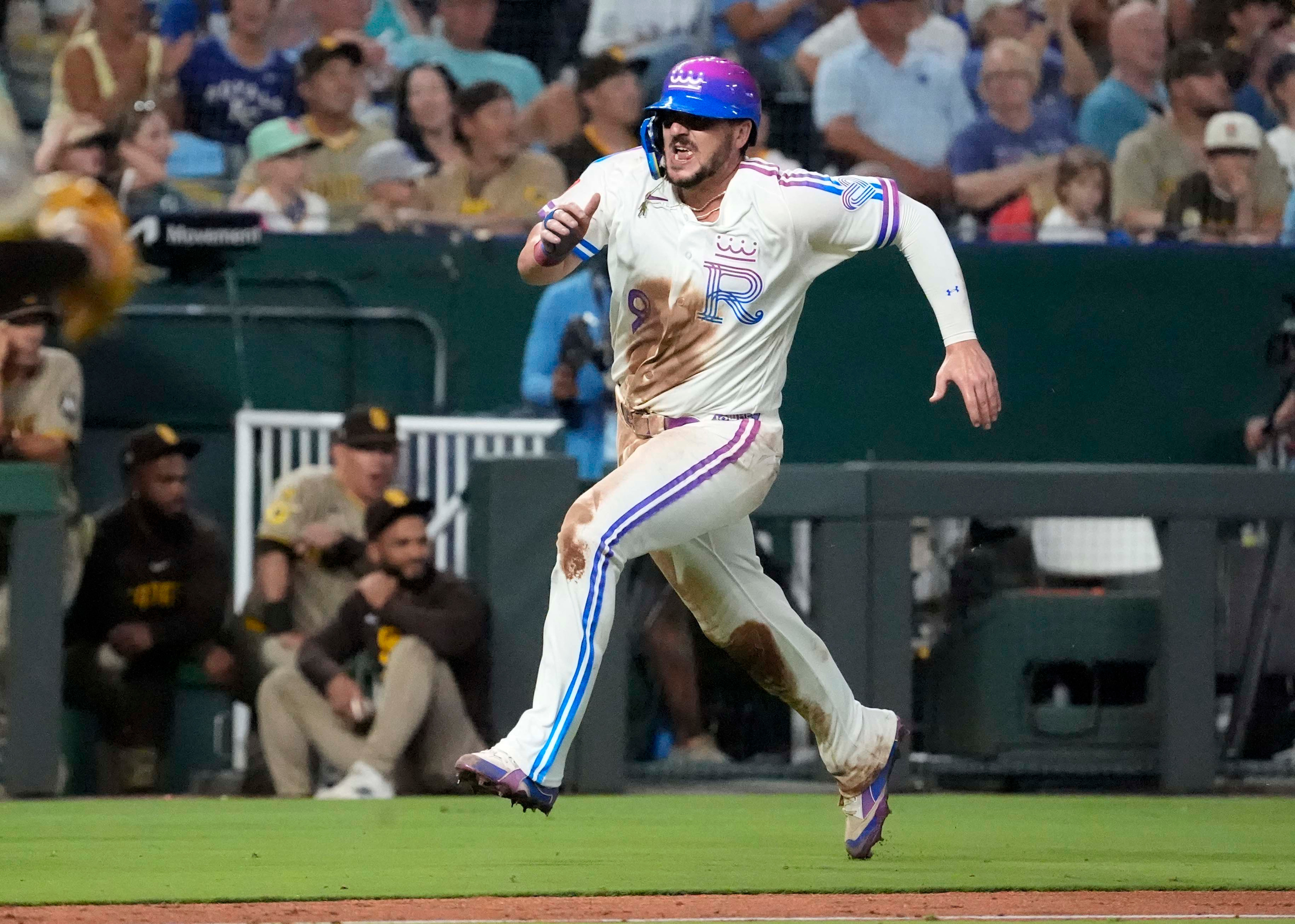 Kansas City Royals first baseman Vinnie Pasquantino (9) races home as he is featured in our Royals vs Tigers win probability.