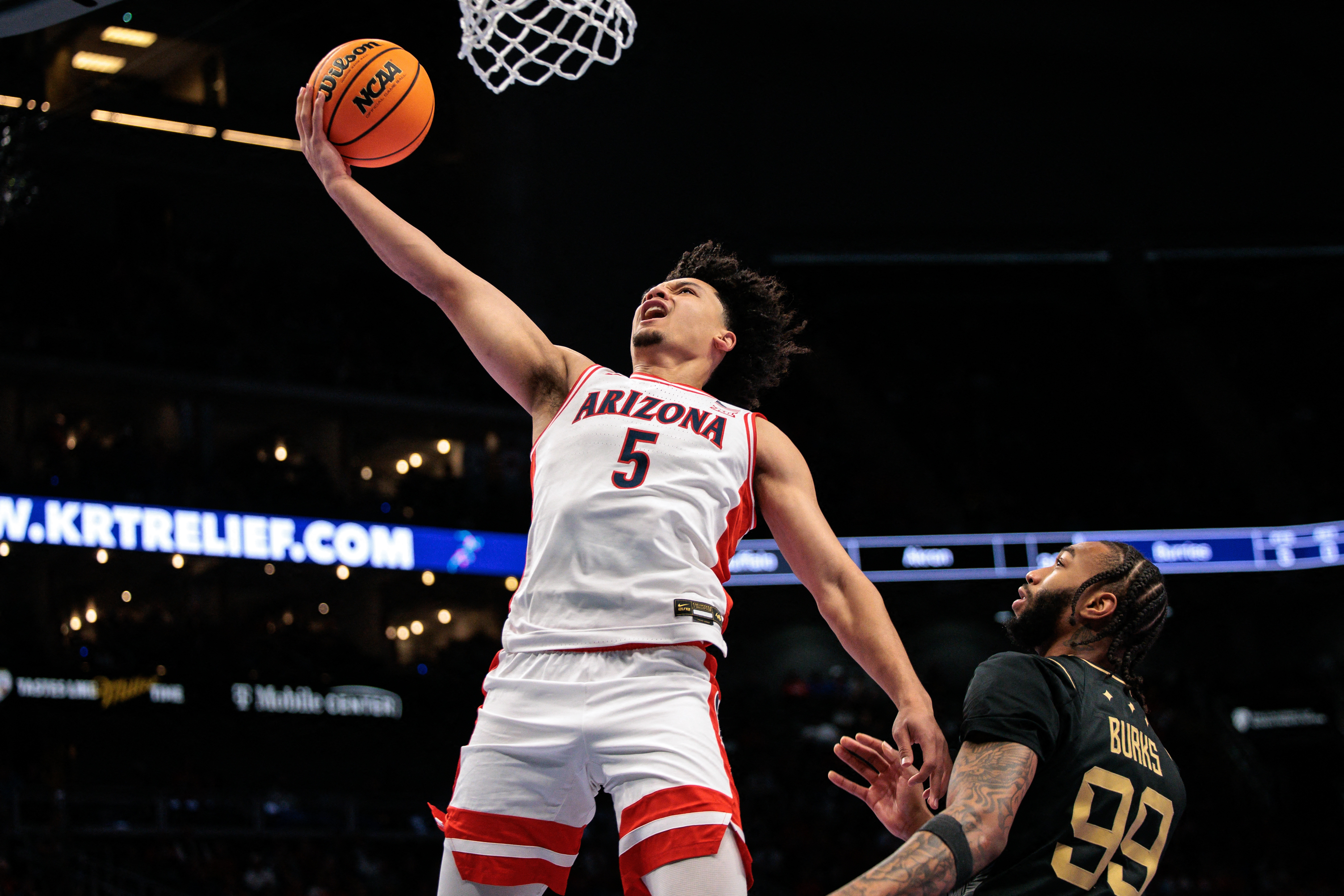Arizona Wildcats guard Brayden Burries (5) shoots the ball as we break down our March Madness MVP Predictions 2026.