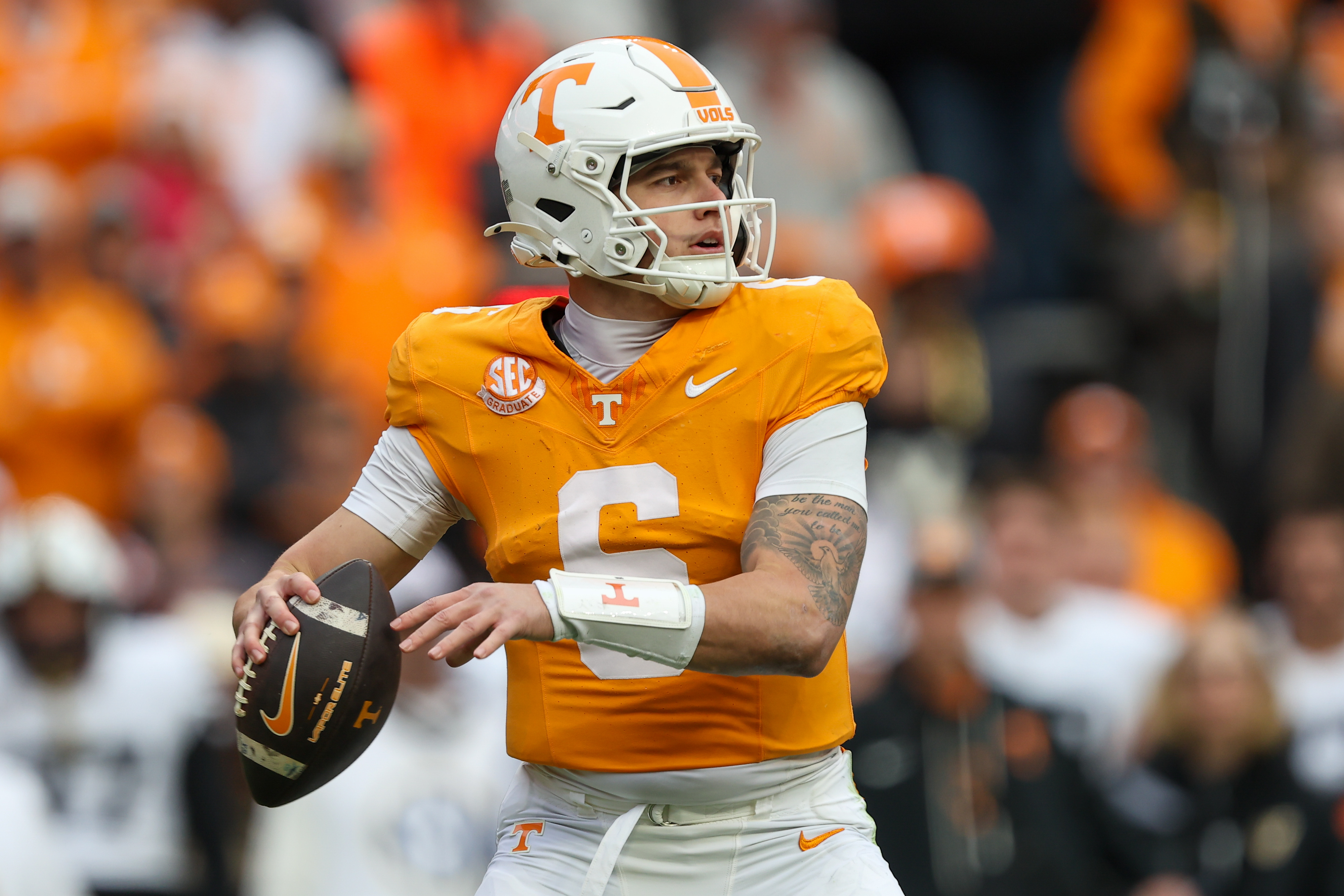 Tennessee quarterback Joey Aguilar (6) looks to throw as we offer our Tennessee vs. Illinois predictions.