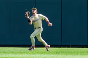 Florida State Seminoles outfielder Max Williams gets an out as we look at the U.S. Supreme Court decision concerning Florida sports betting.