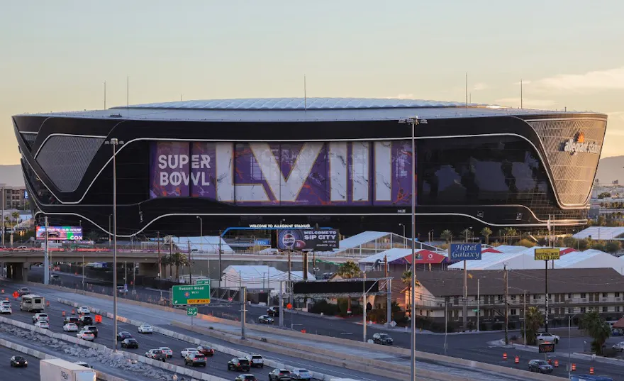 An exterior view shows signage for Super Bowl LVIII at Allegiant Stadium as we look at the best Super Bowl odds boosts and betting promotions for existing users.