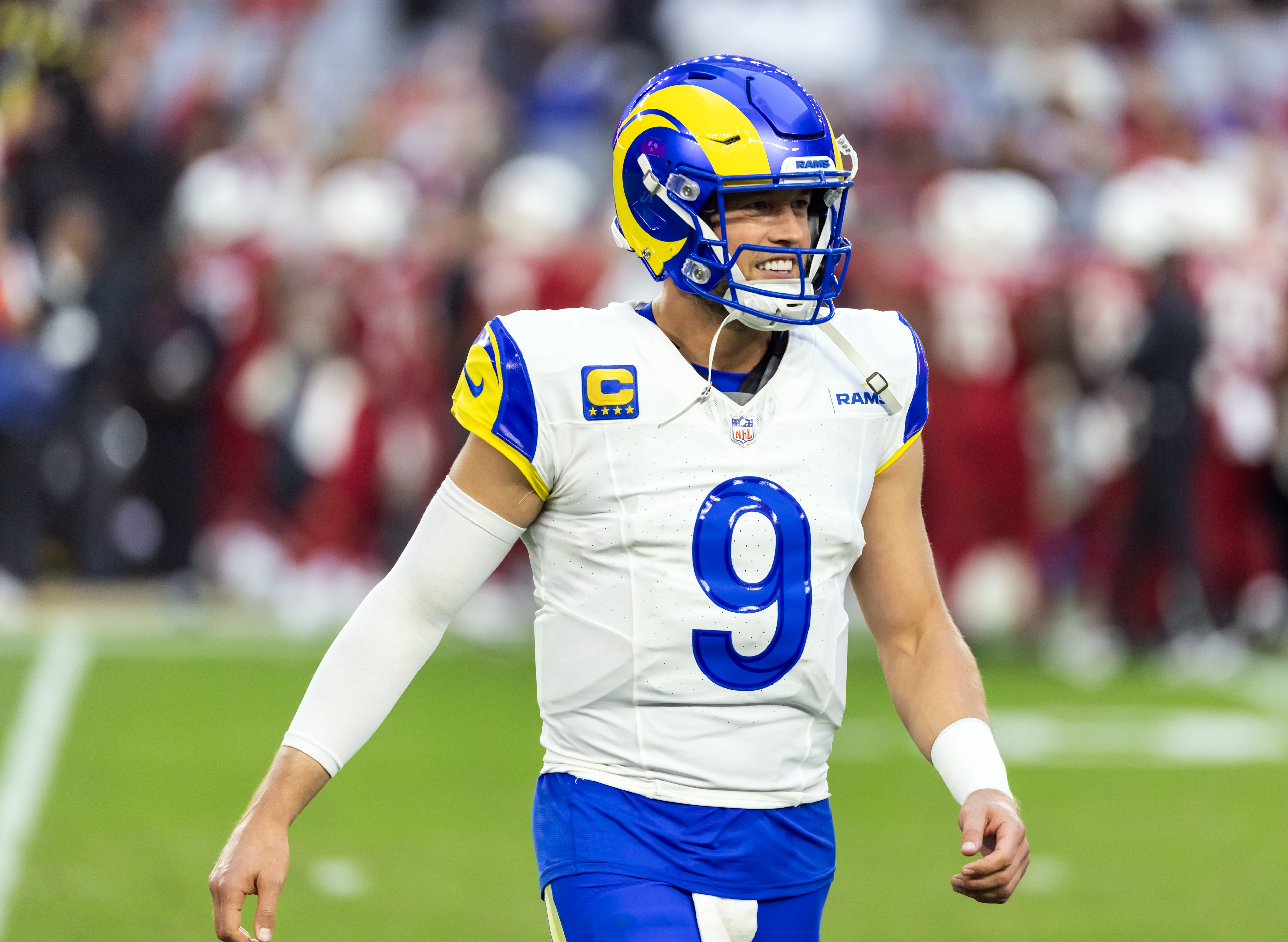  Los Angeles Rams quarterback Matthew Stafford (9) smiles as we offer our Matthew Stafford player prop picks for Monday Night Football.