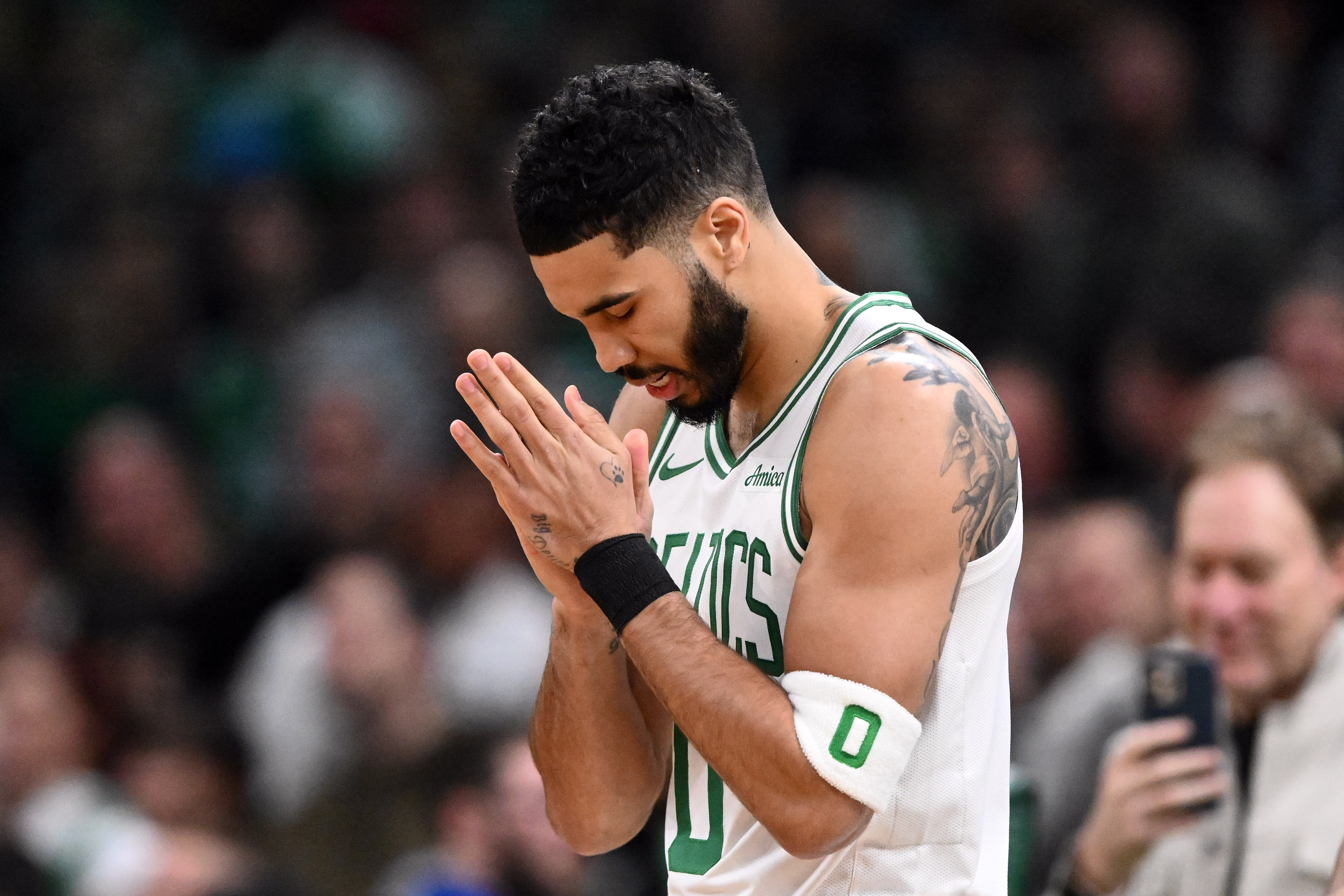 Boston Celtics forward Jayson Tatum (0), seen here reacting before a game, returns tonight against the Dallas Mavericks as we break down our Jayson Tatum player props.