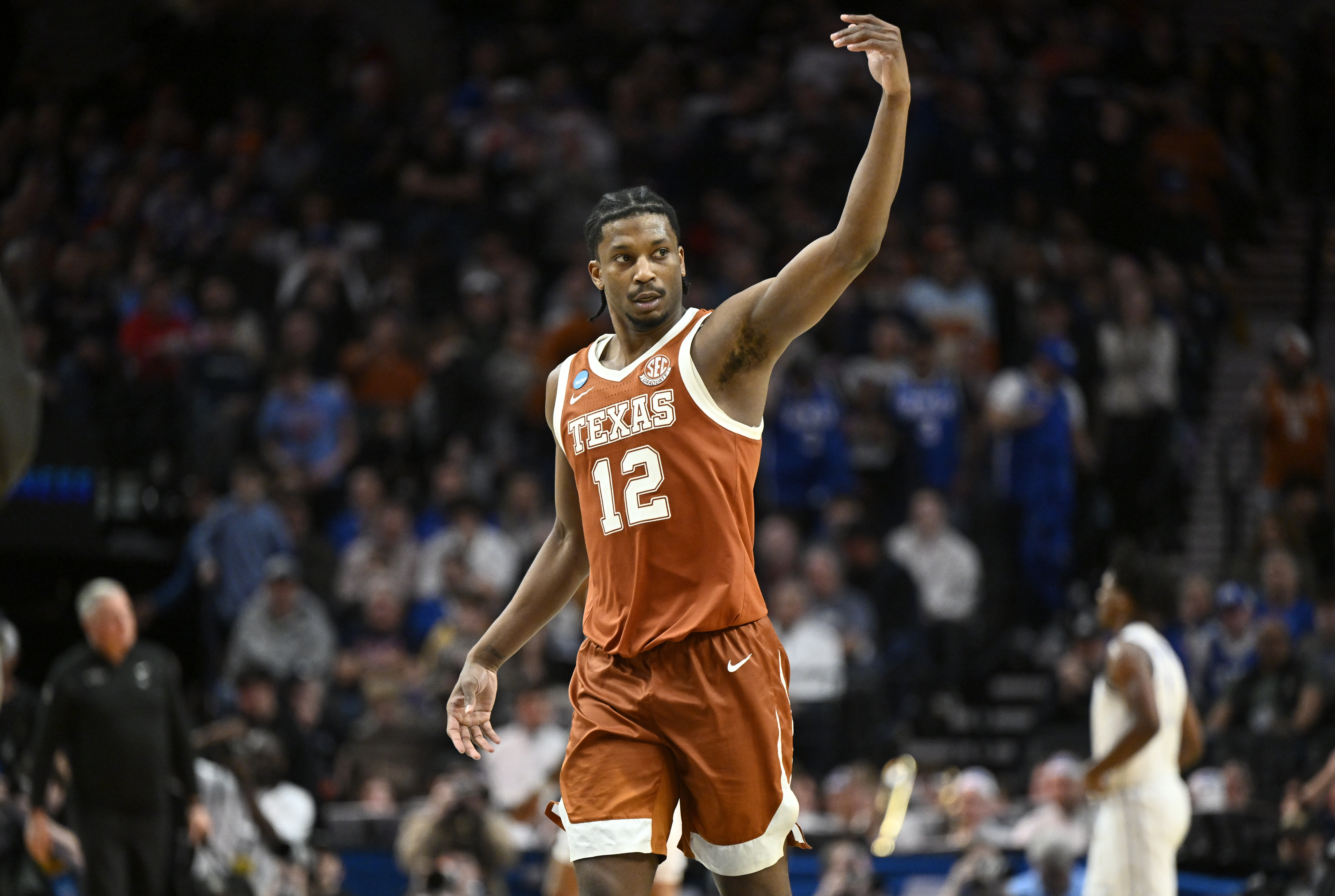 Texas Longhorns guard Tramon Mark celebrates as we make our best Texas vs. Gonzaga prediction and parlay.