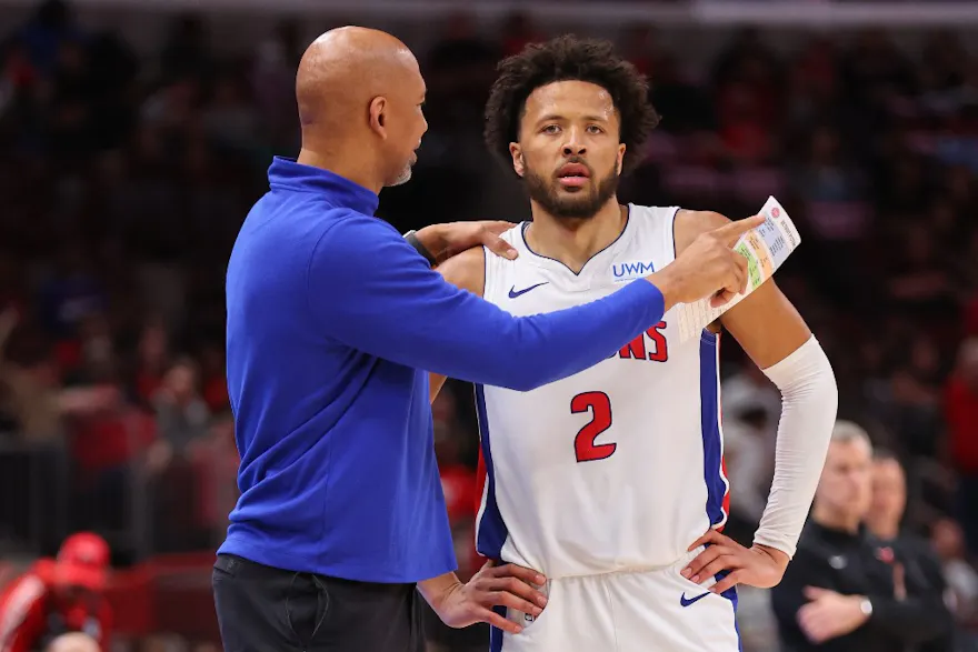 Head coach Monty Williams of the Detroit Pistons talks with Cade Cunningham as we look at the best NBA player props & best bets for Wednesday