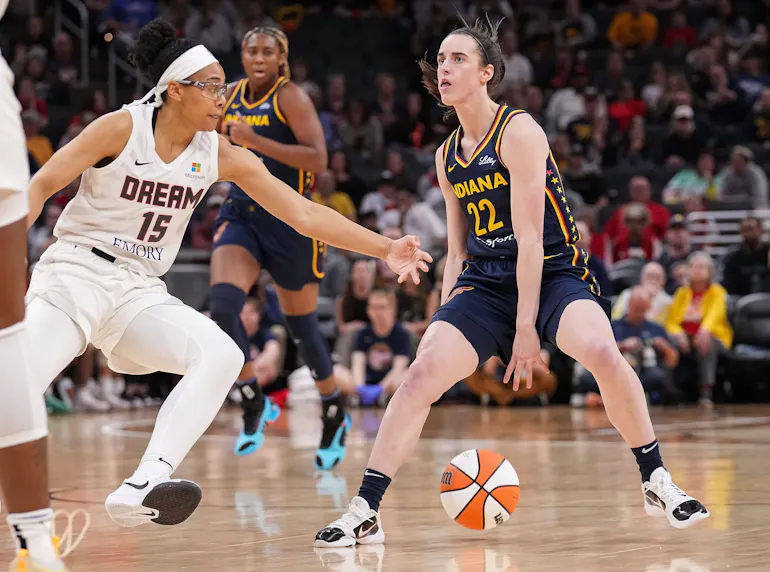 Indiana Fever guard Caitlin Clark (22) rushes up the court as we offer our best Dream vs. Fever prediction and expert picks for Sunday's WNBA matchup at Gainbridge Fieldhouse in Indianapolis.