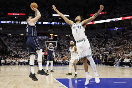 Luka Doncic (77) shoots the ball as we offer our best Mavericks vs. Timberwolves player props for Game 2 of the Western Conference Finals at Target Center on Friday.